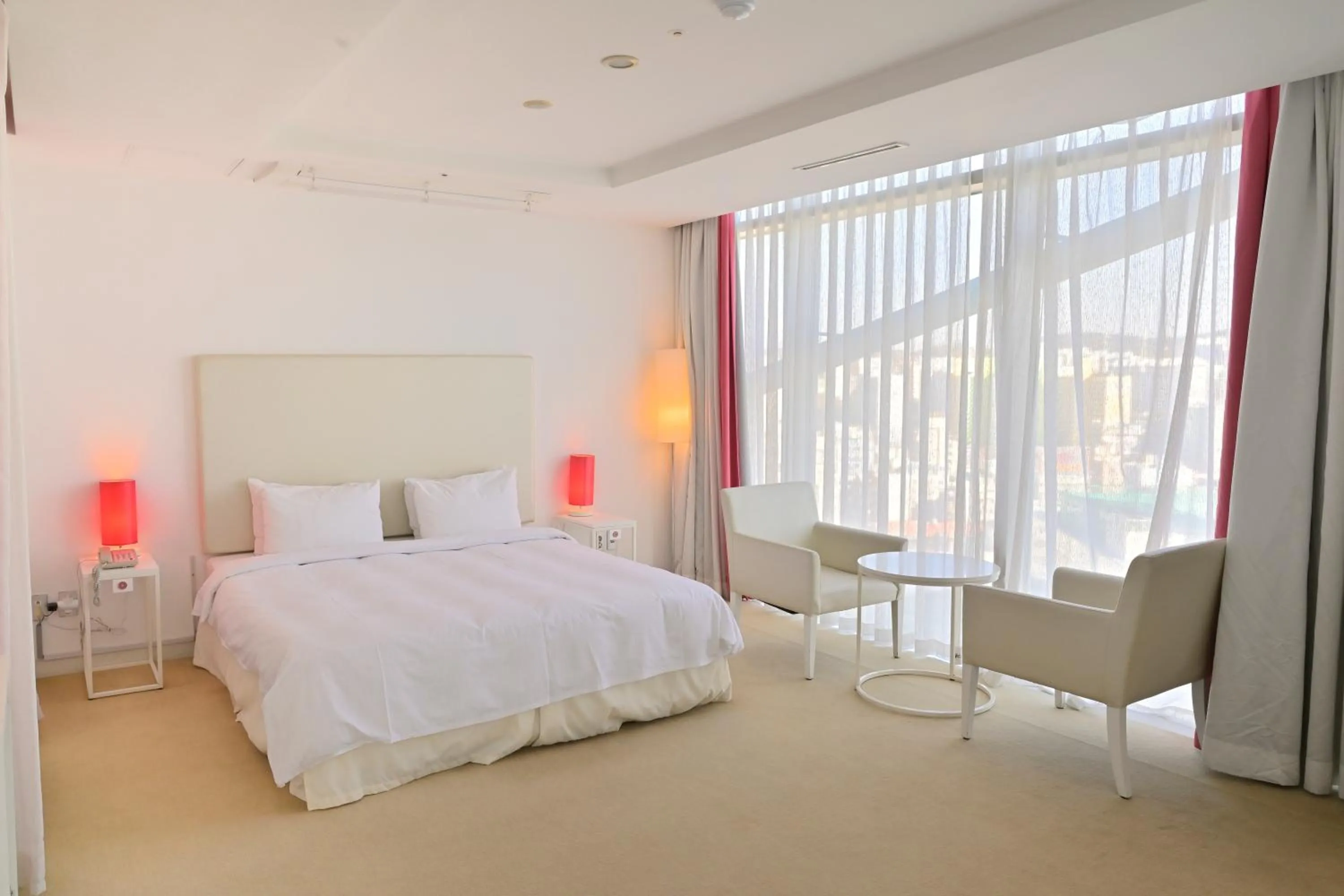 Bed in Ecograd Hotel