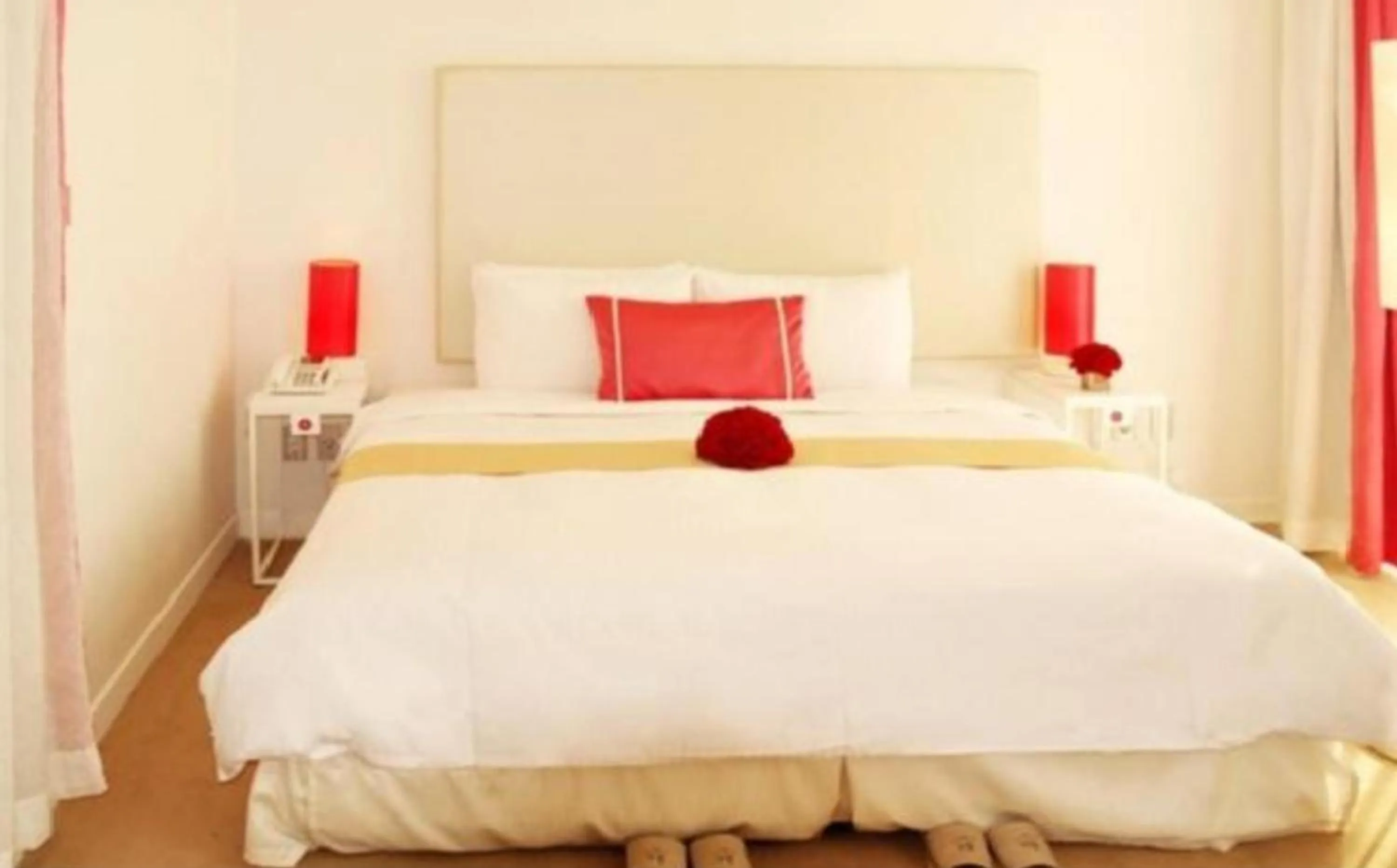 Bed in Ecograd Hotel