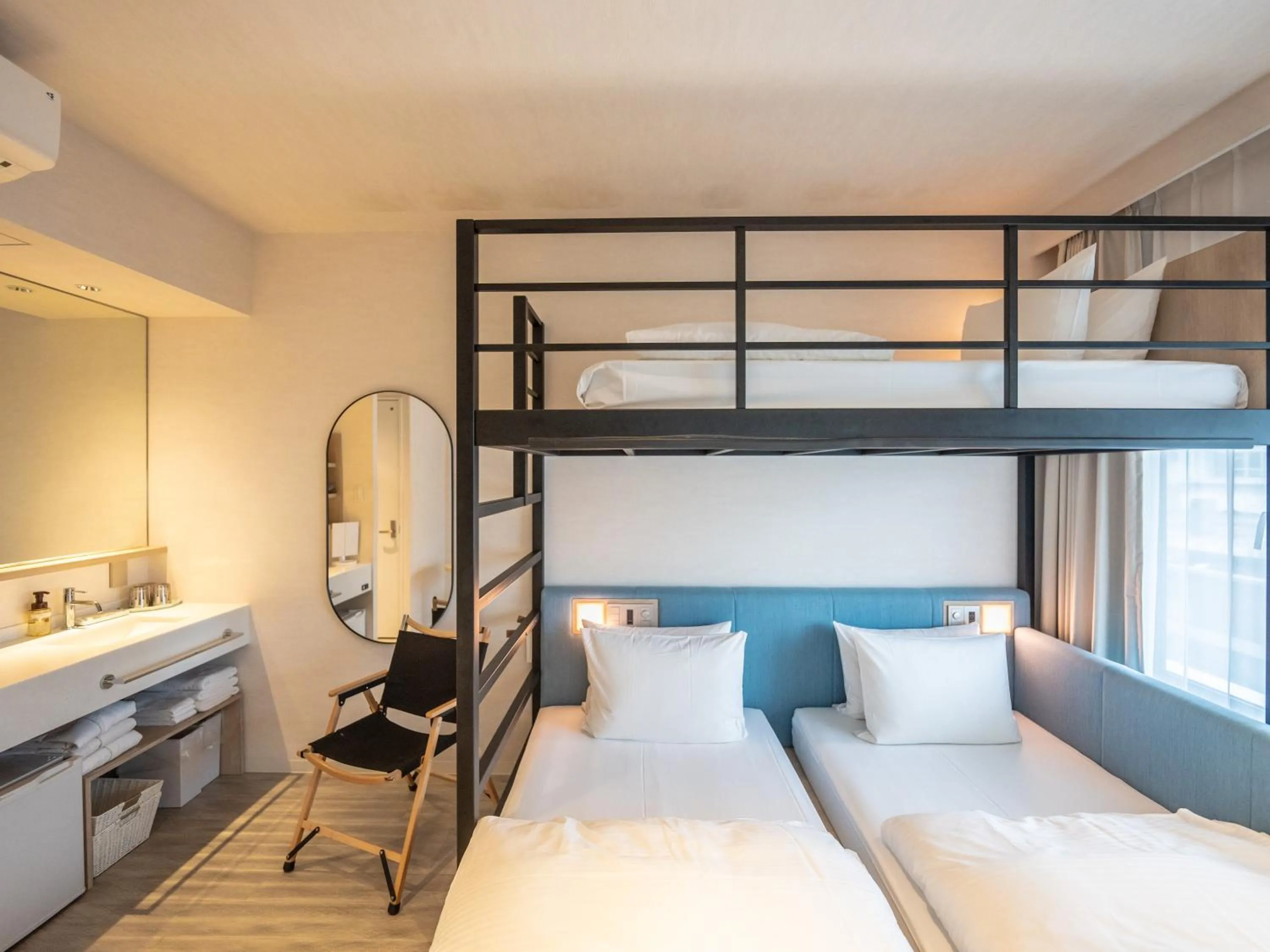 Photo of the whole room, Bed in Tabino Hotel lit Miyakojima