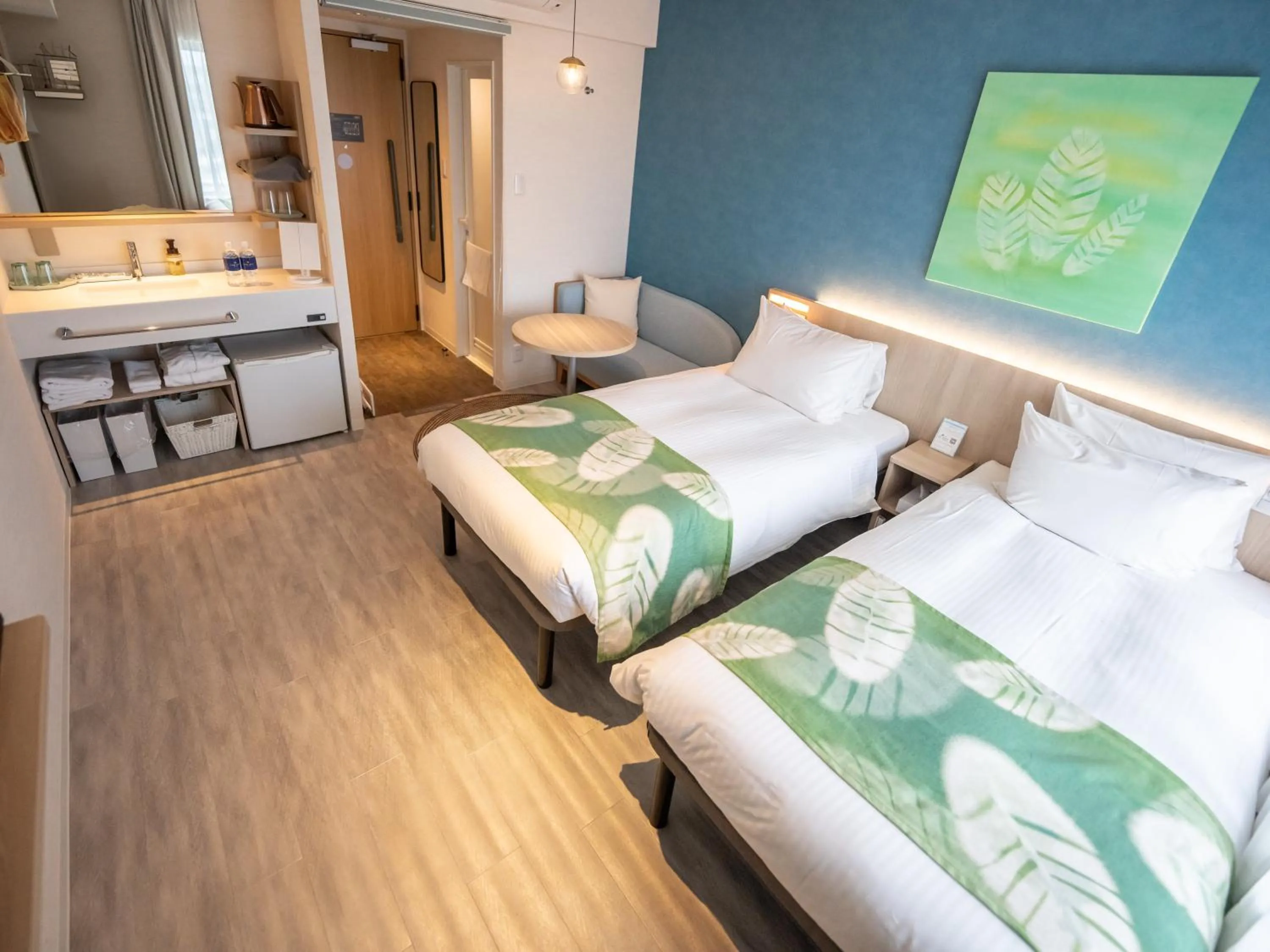 Photo of the whole room, Bed in Tabino Hotel lit Miyakojima