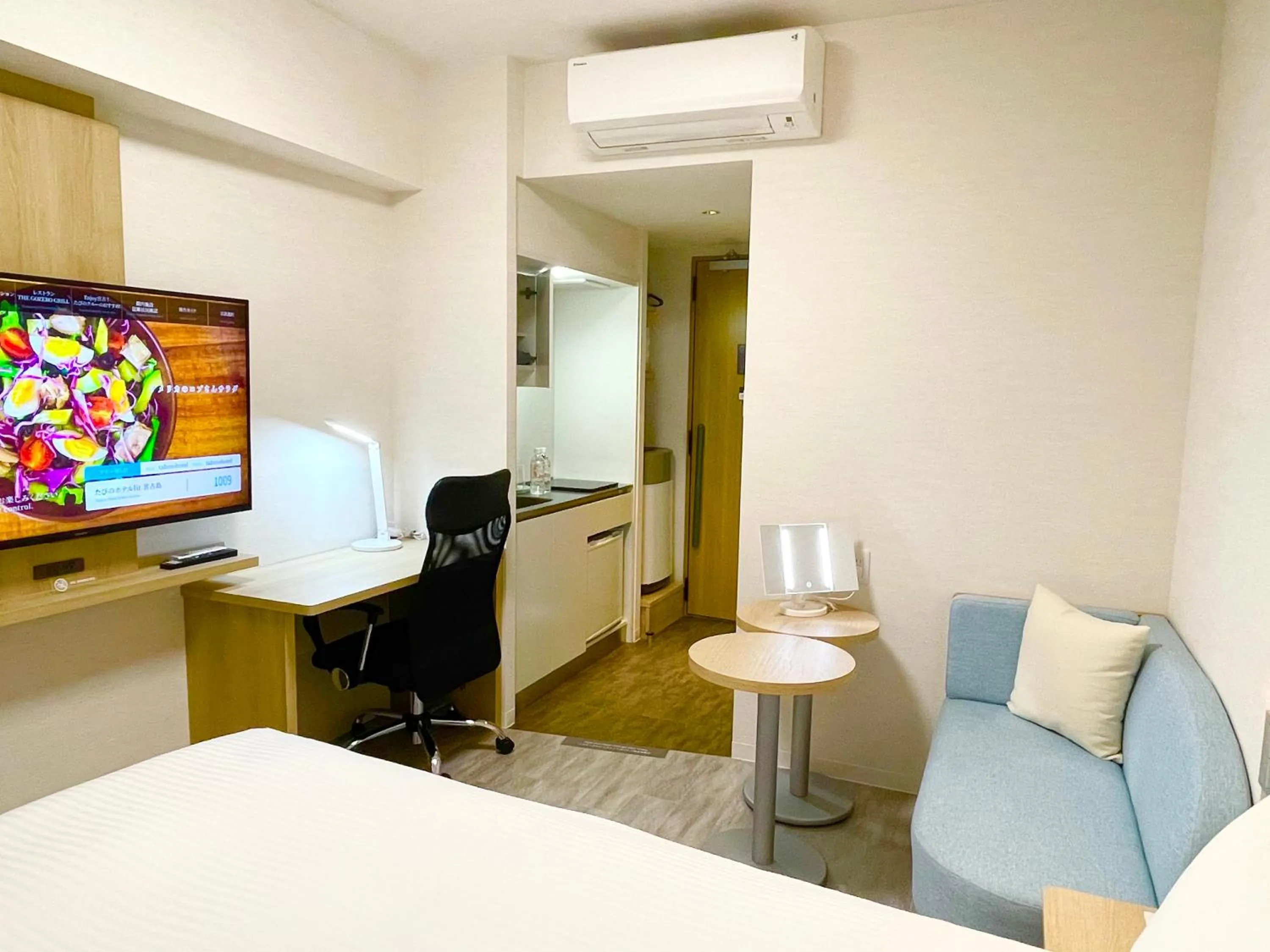 Bed in Tabino Hotel lit Miyakojima