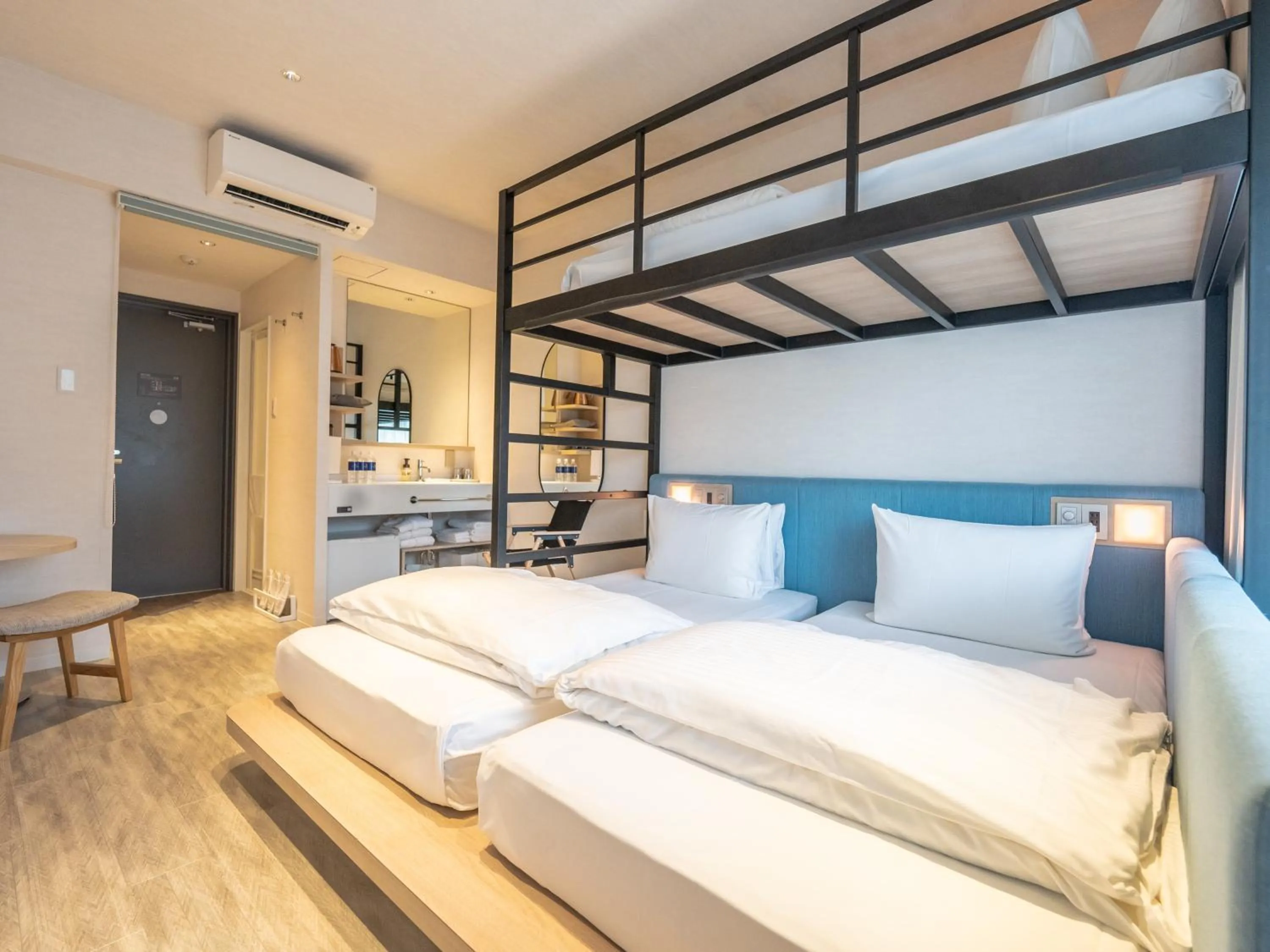 Photo of the whole room, Bed in Tabino Hotel lit Miyakojima