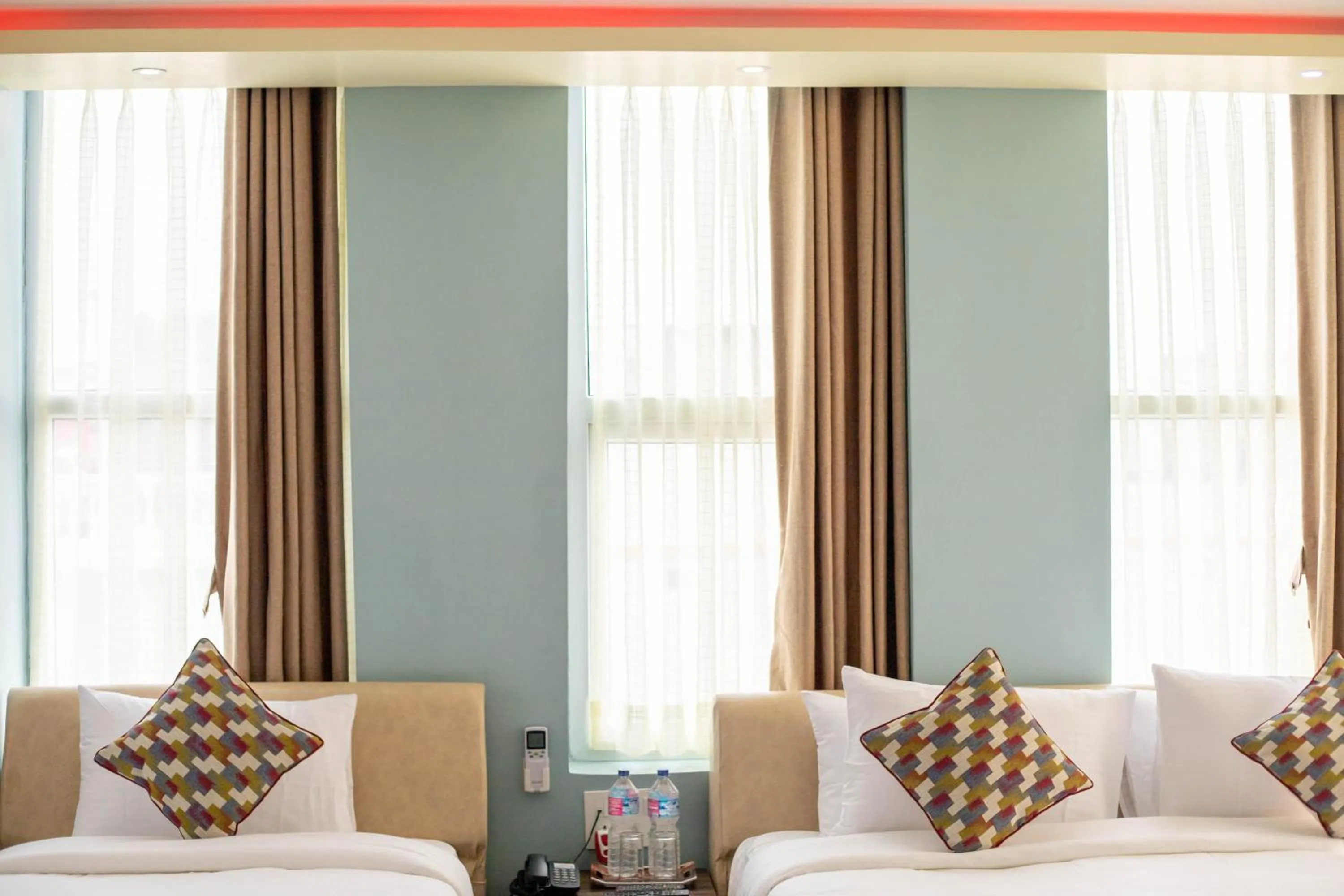 Bed in Siddhartha Hotel Grand City