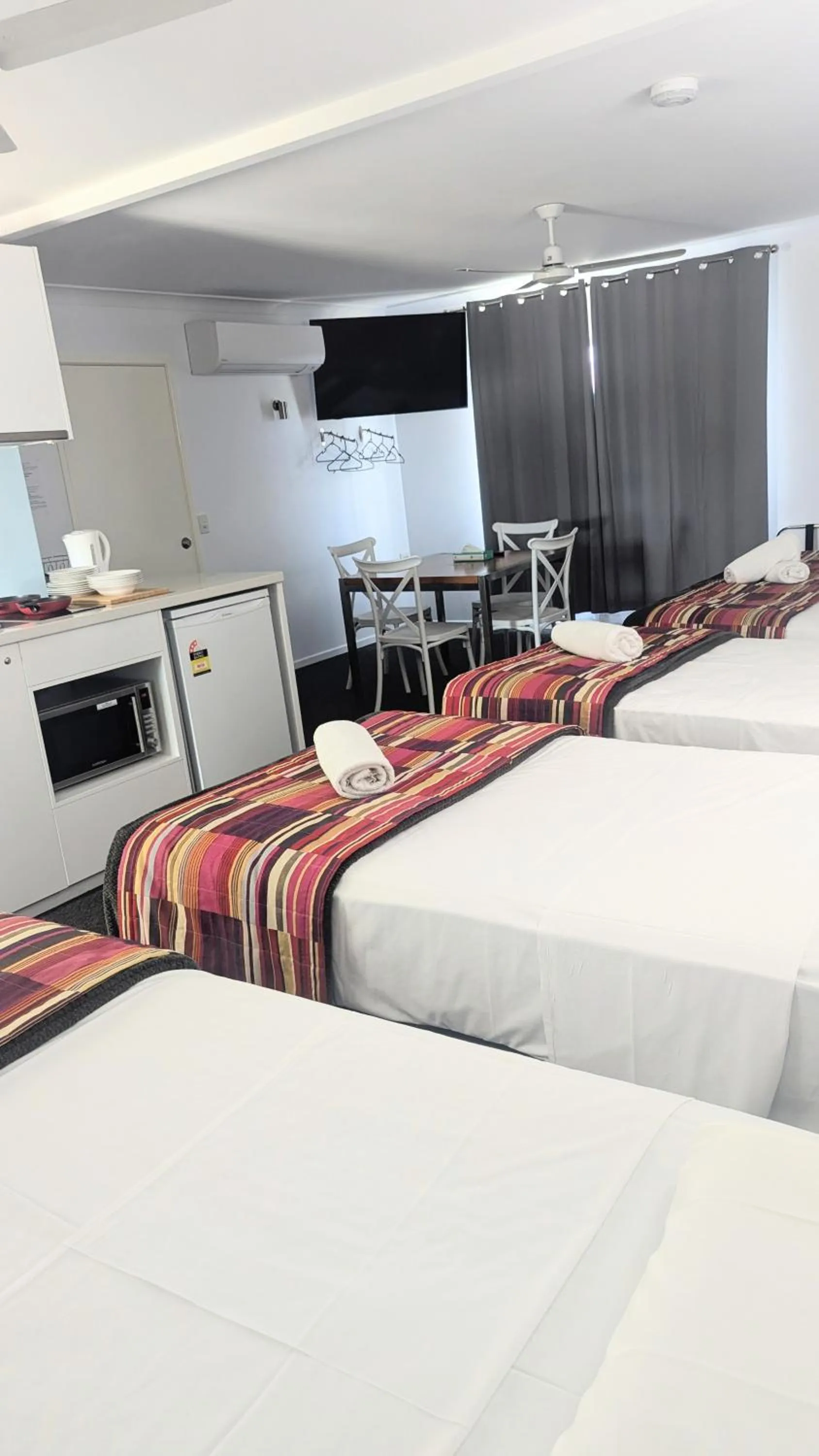 Bed in PROSERPINE MOTOR LODGE