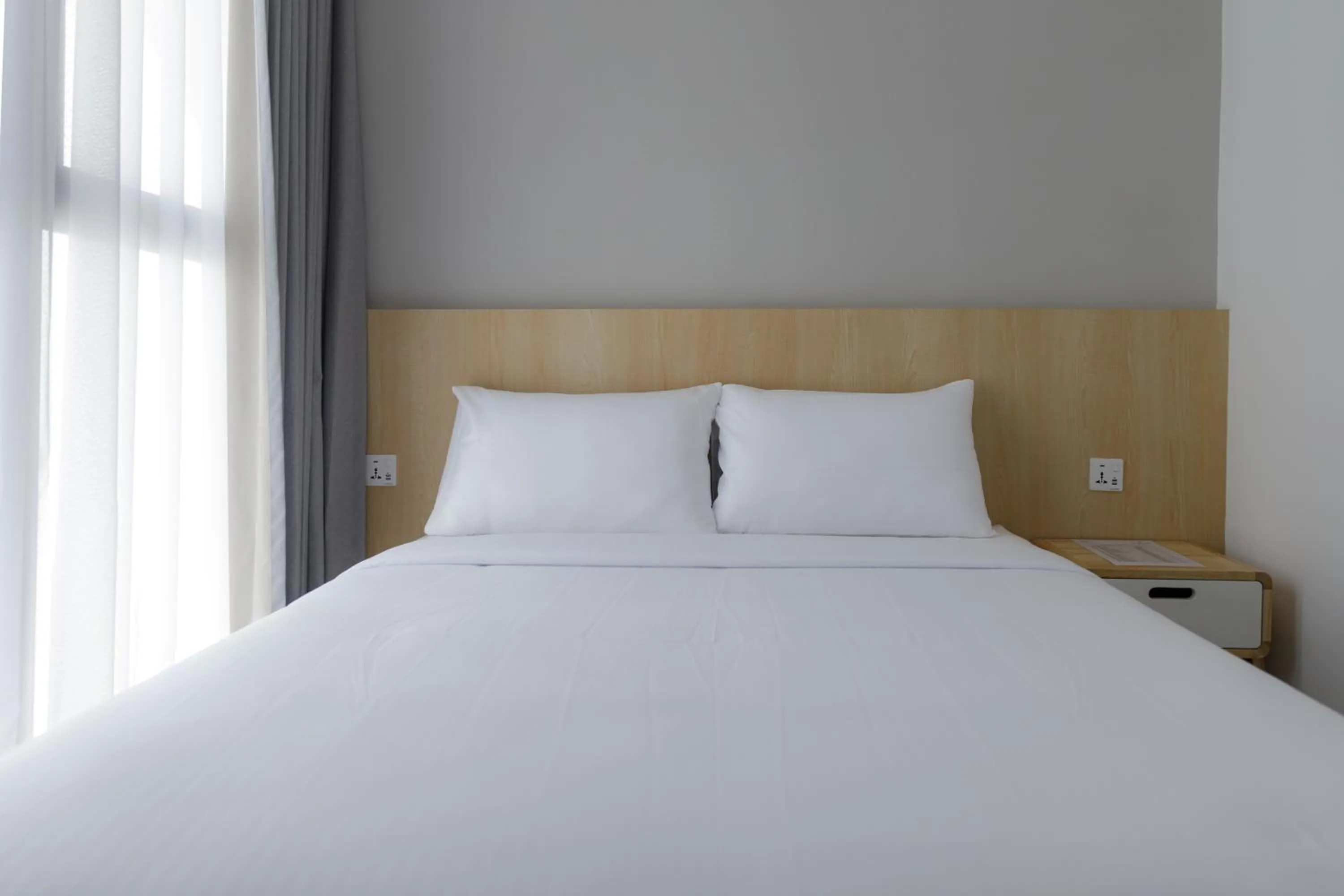 Bed in The Journey hotel