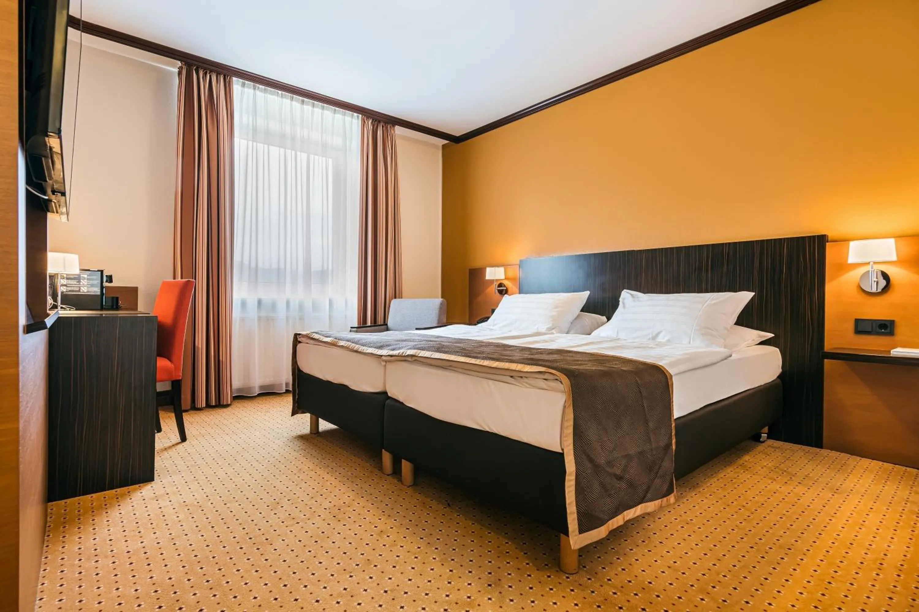 Bed in Trans World Hotel Donauwelle