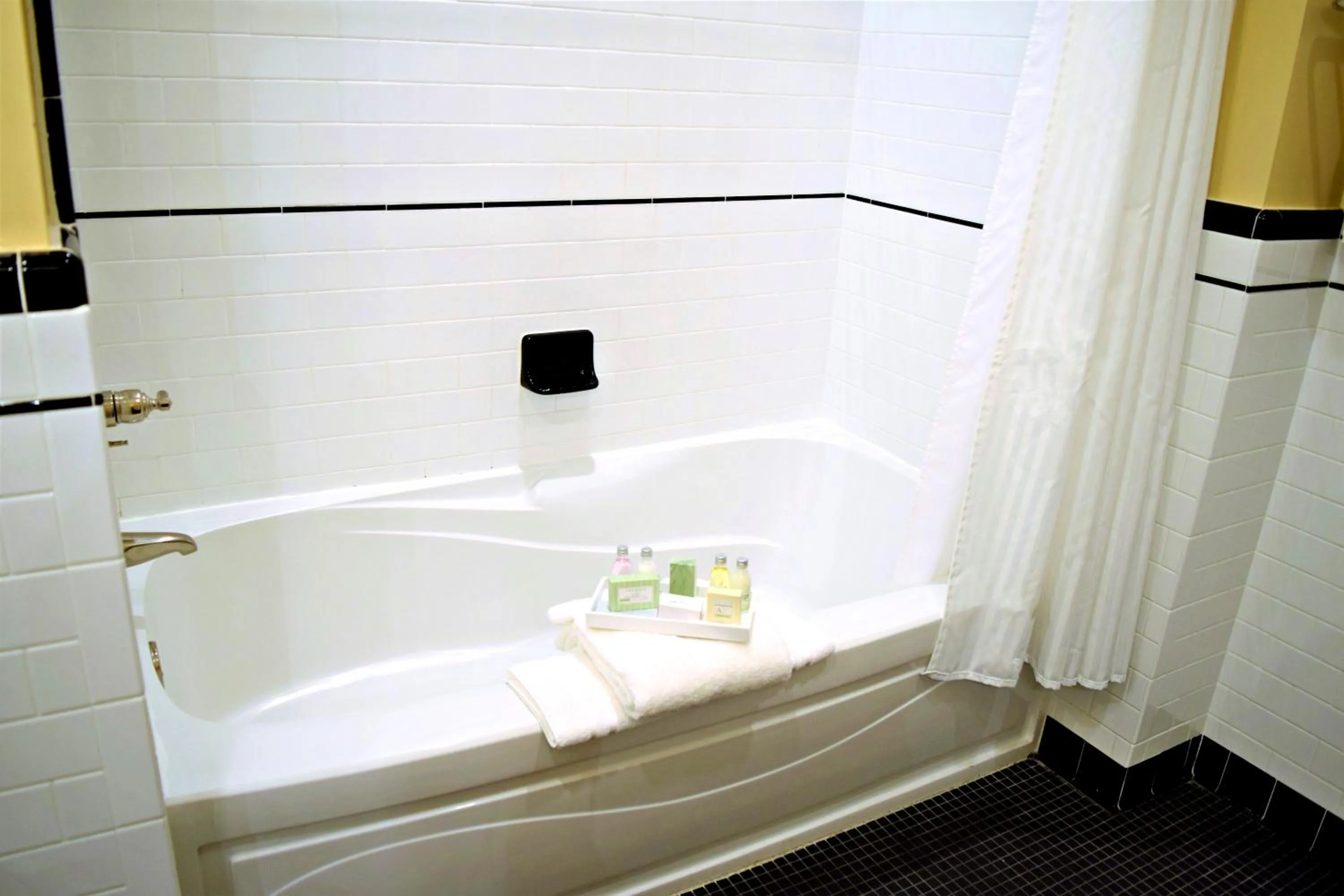 Bath in JH Adams Inn, Trademark Collection by Wyndham