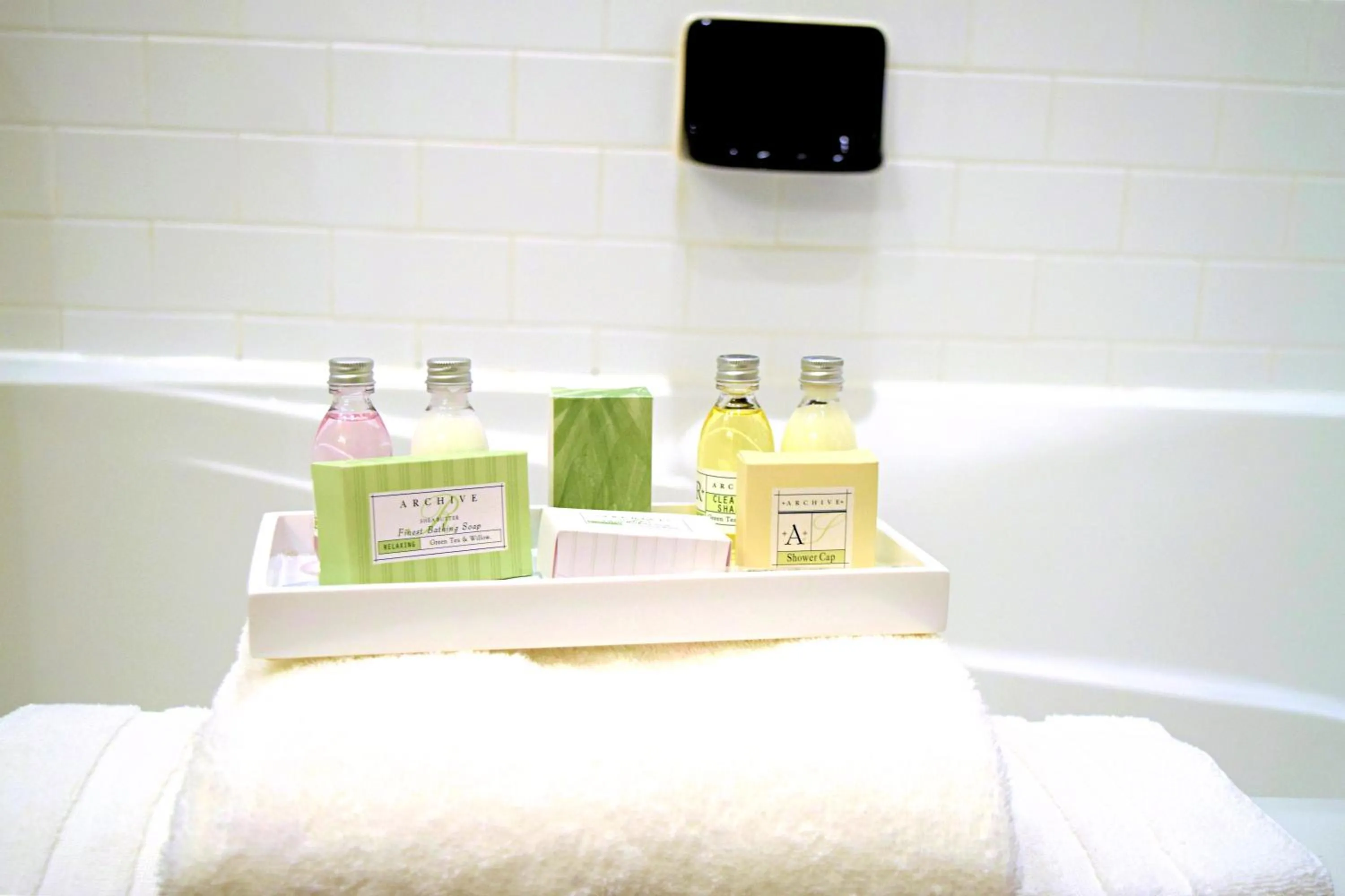 Bathroom, Bed in JH Adams Inn, Trademark Collection by Wyndham