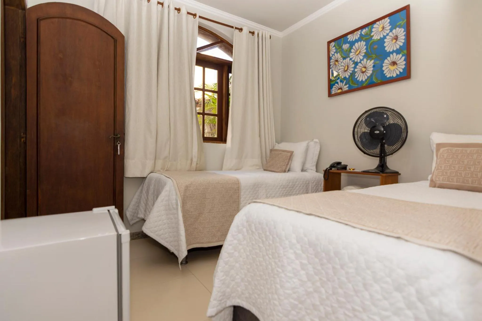 Bed in POUSADA CAPIM LIMÃO