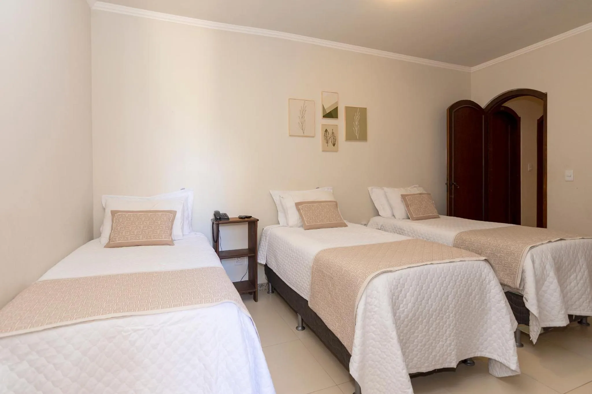 Bed in POUSADA CAPIM LIMÃO