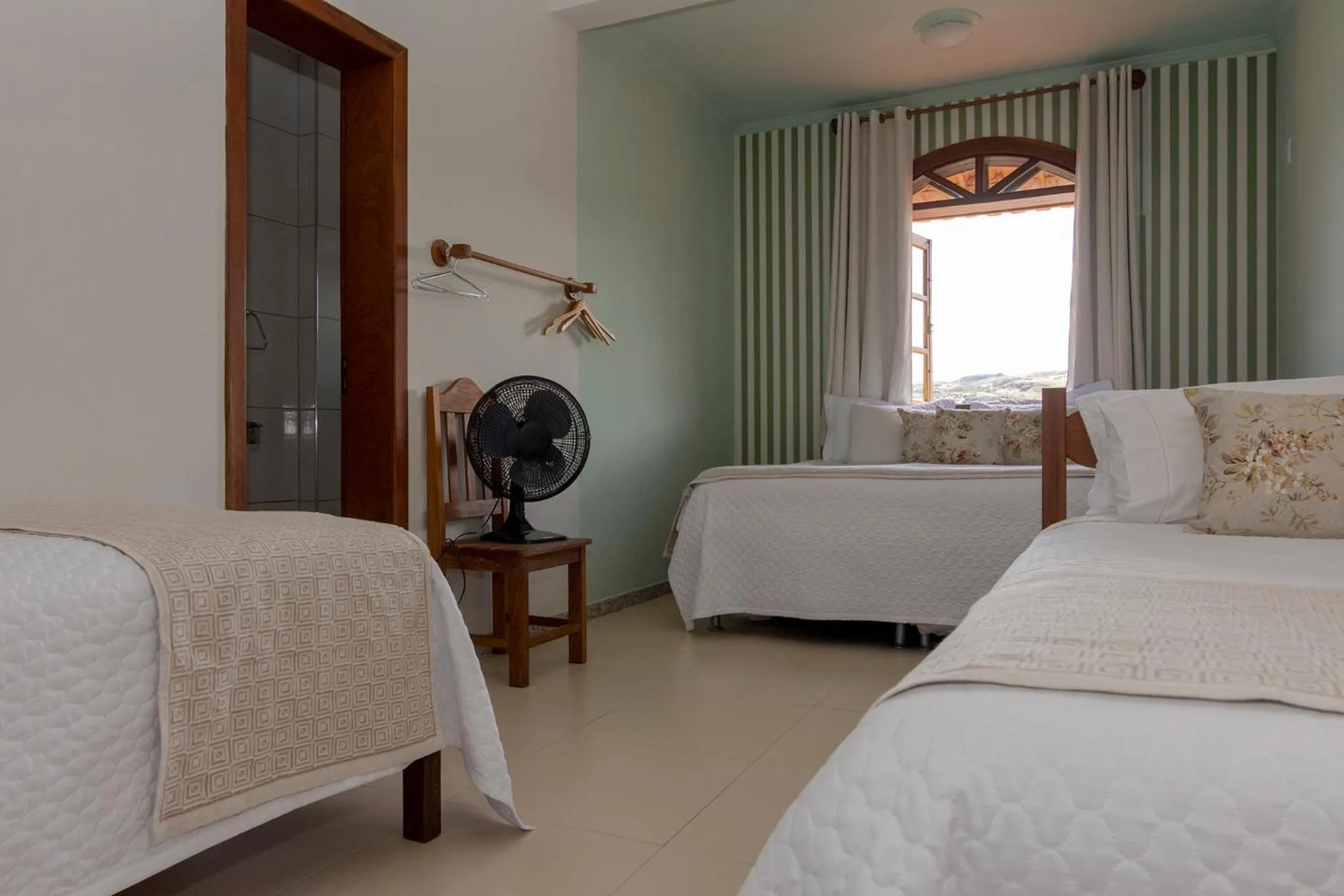 Bed in POUSADA CAPIM LIMÃO