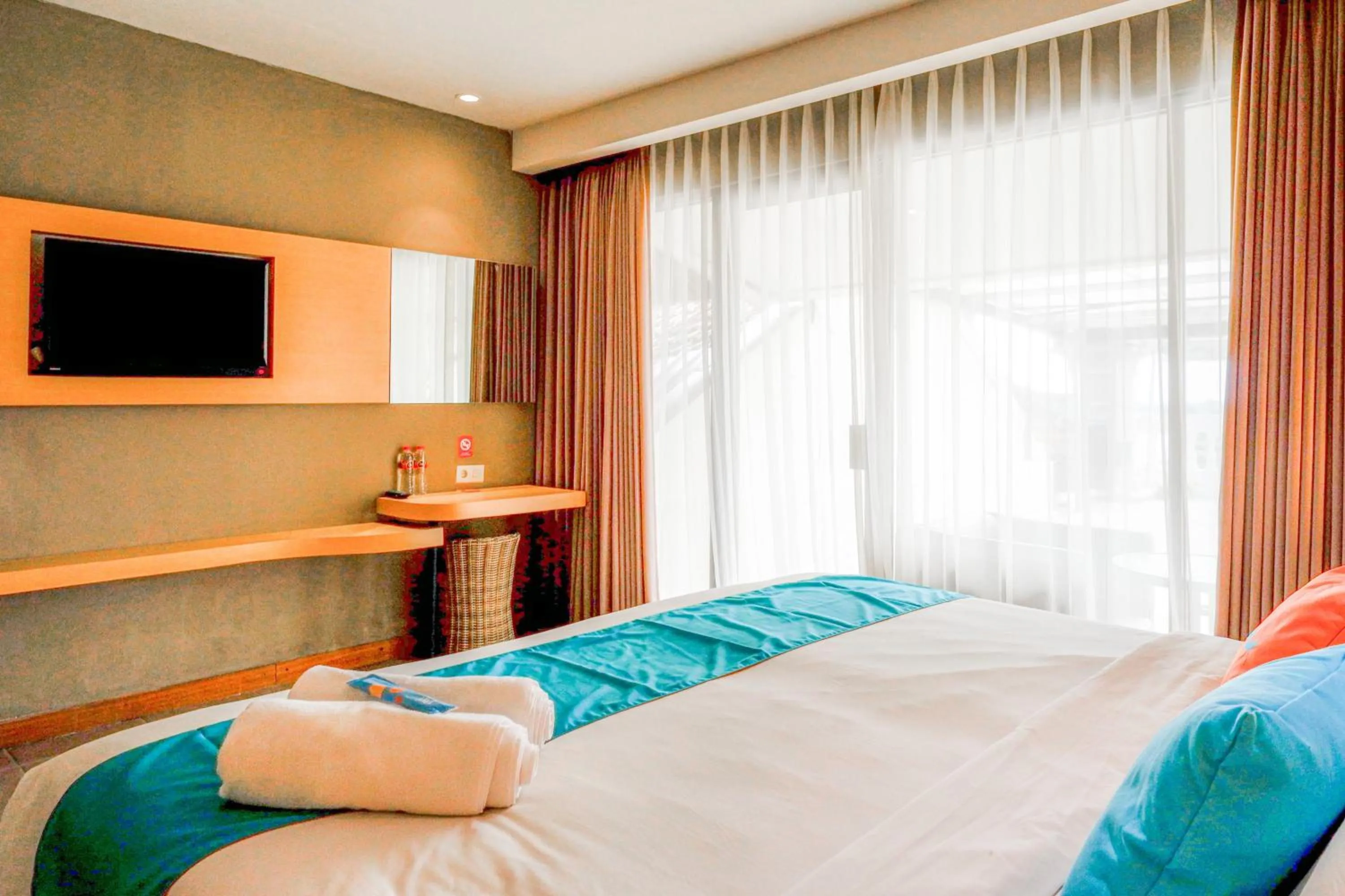 Bedroom, Bed in Sans Hotel Ekkon Yogyakarta by Reddoorz