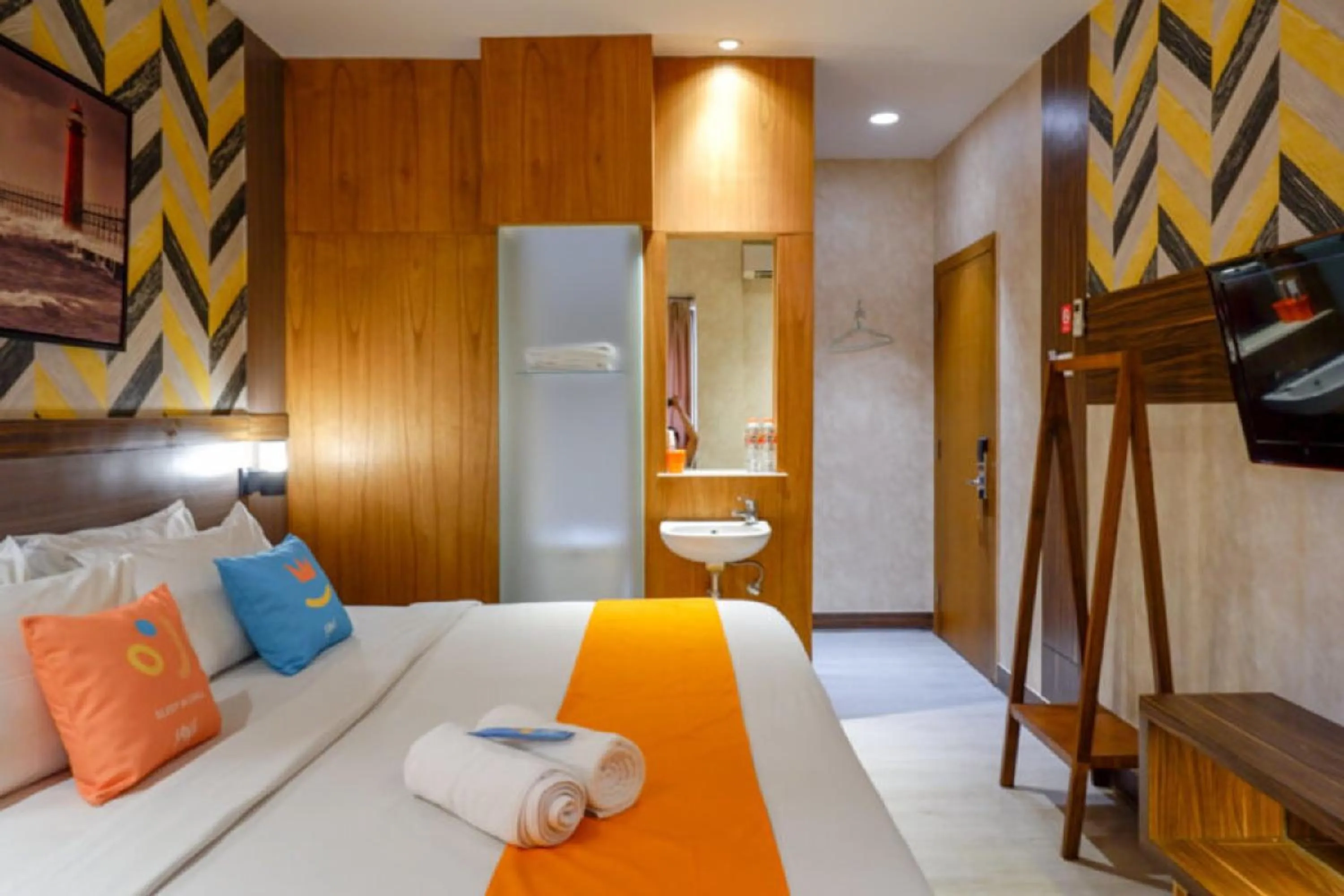 Bed in Sans Hotel Ekkon Yogyakarta by Reddoorz