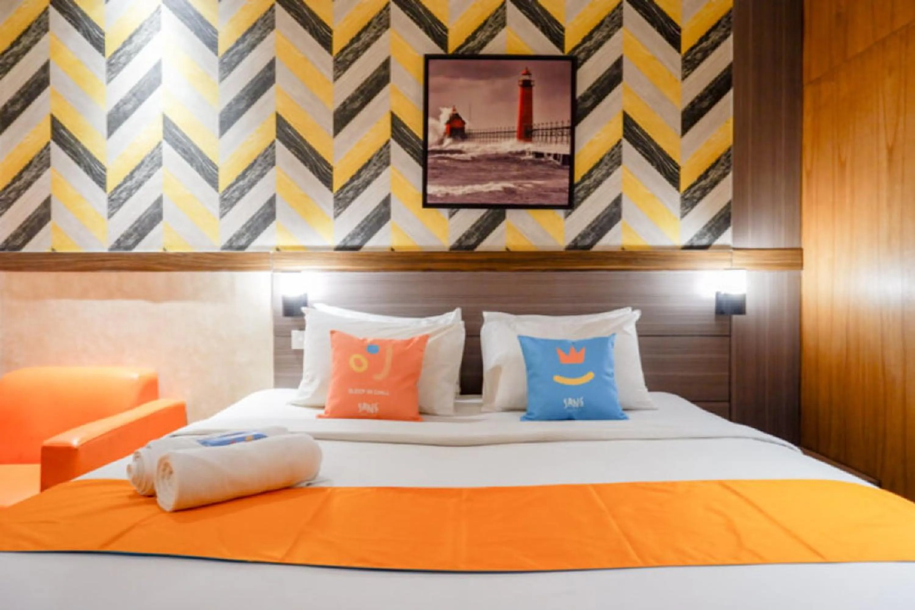 Bed in Sans Hotel Ekkon Yogyakarta by Reddoorz