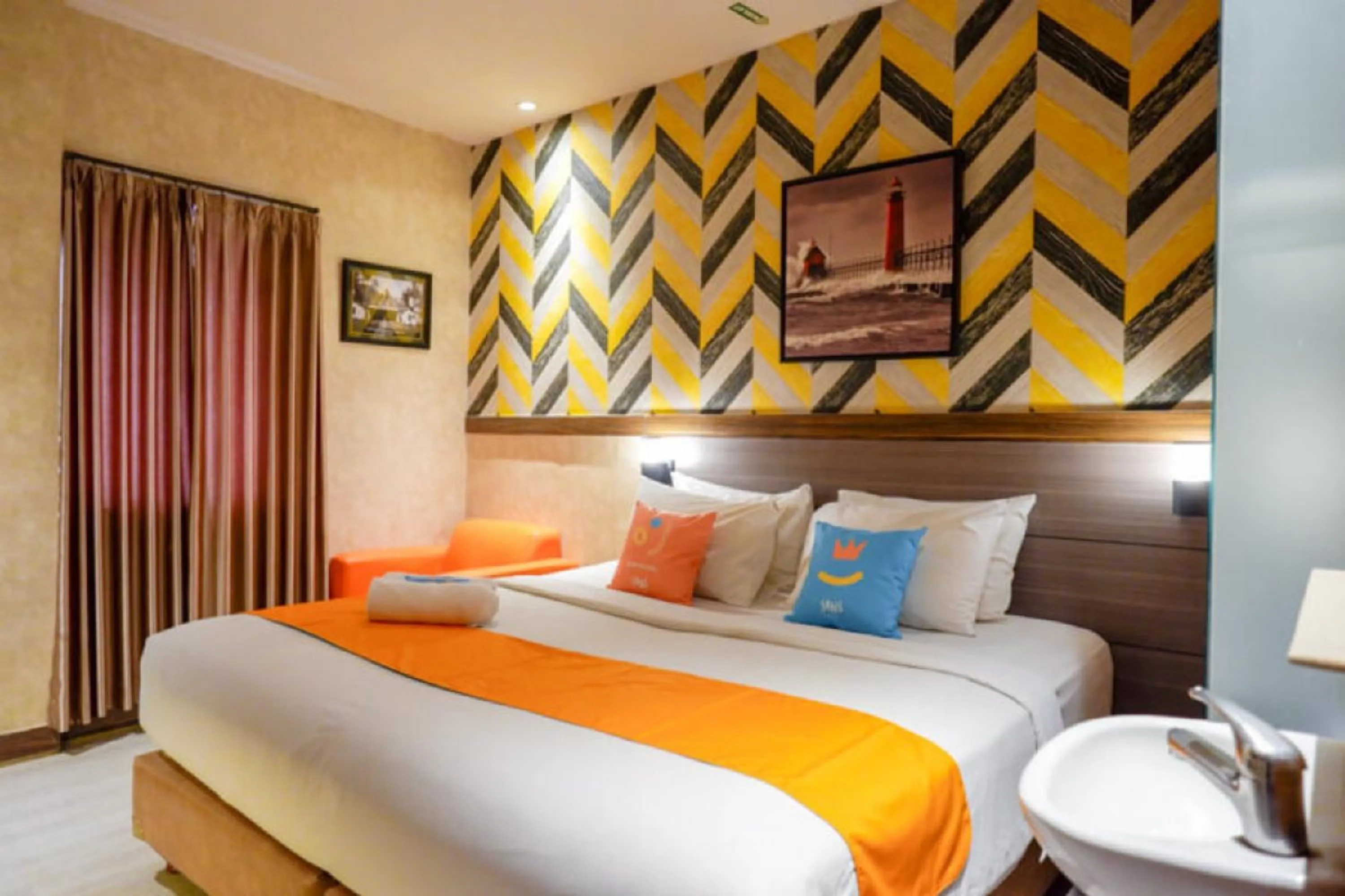 Bed in Sans Hotel Ekkon Yogyakarta by Reddoorz