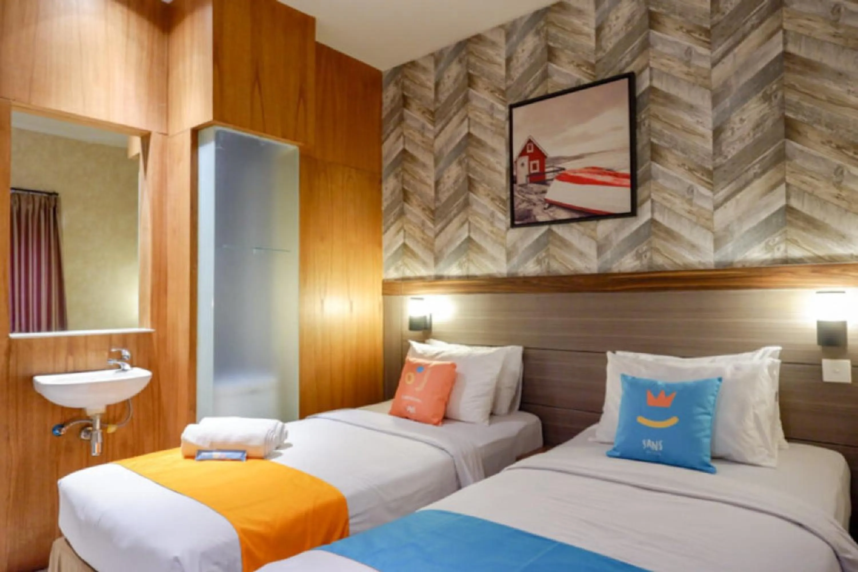 Bed in Sans Hotel Ekkon Yogyakarta by Reddoorz