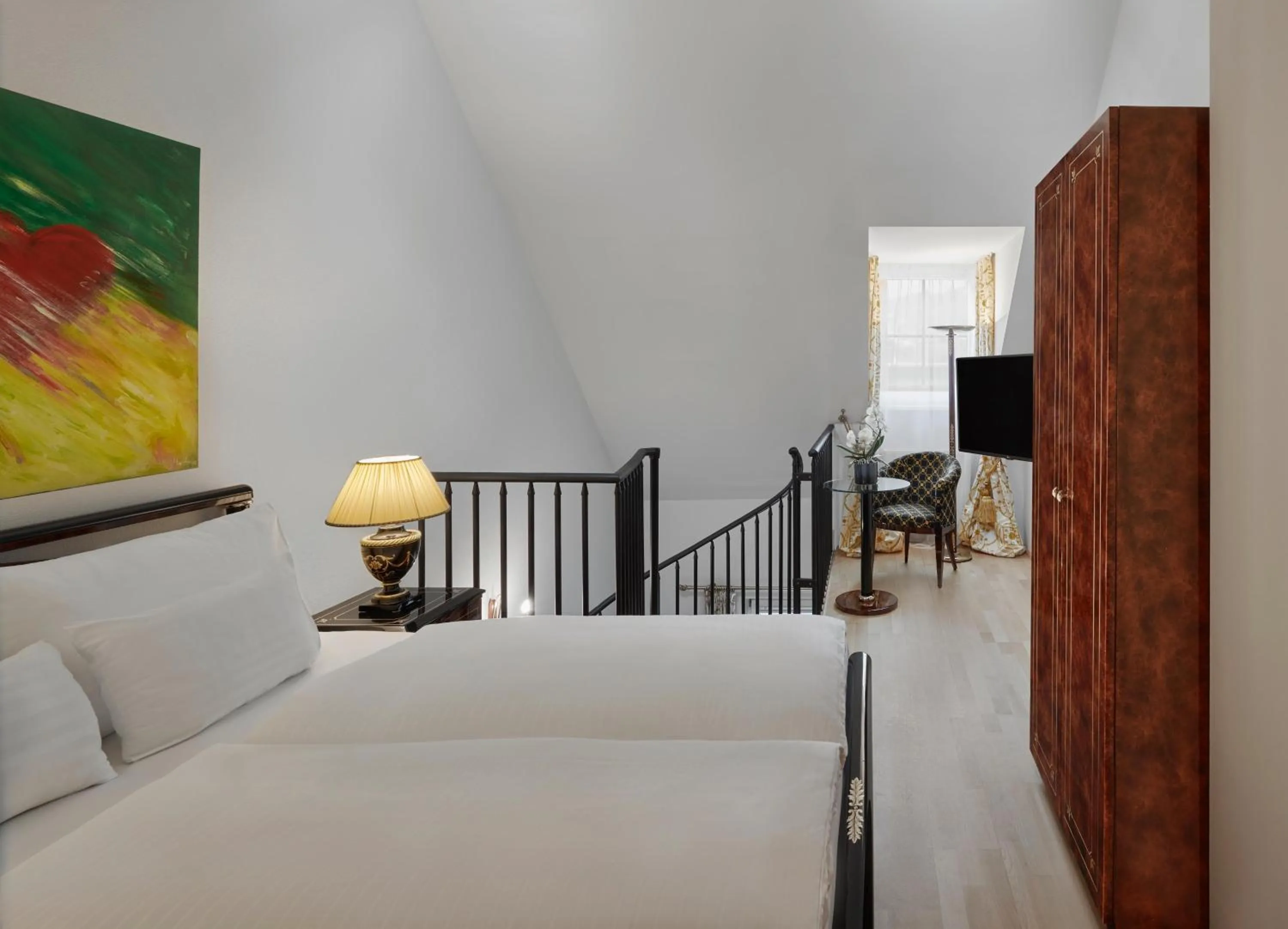 Photo of the whole room, Bed in Hotel Schwarzer Adler Innsbruck