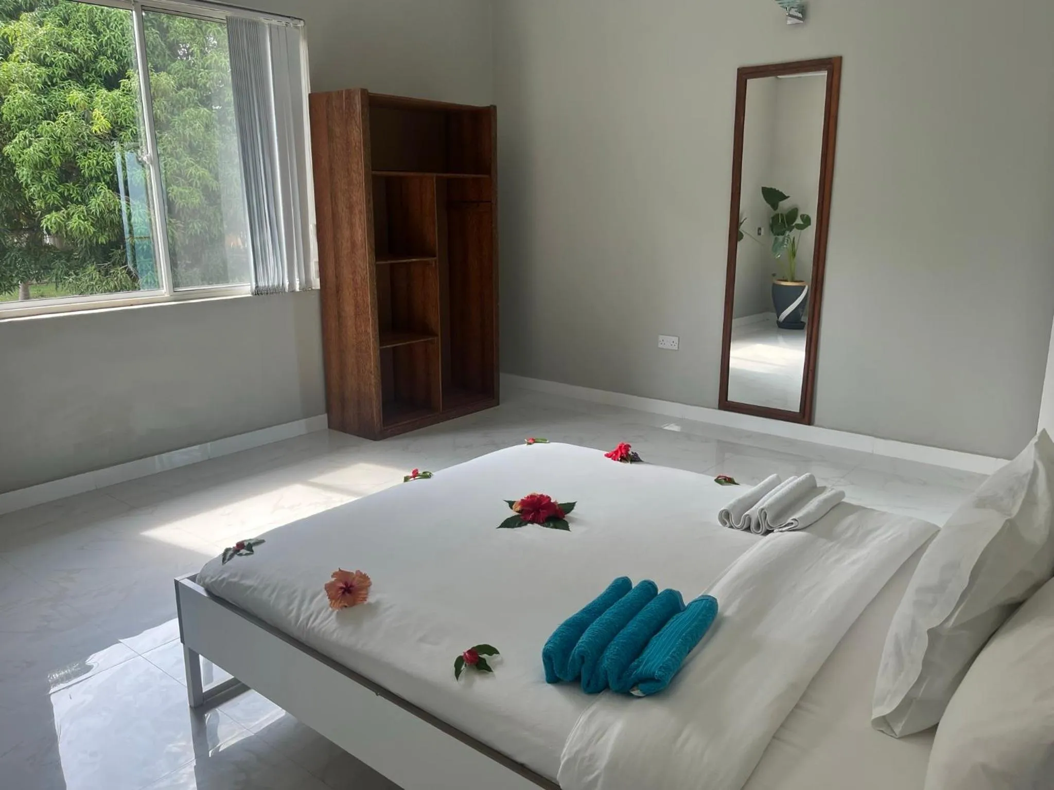 Bed in Calamari Beach Resort