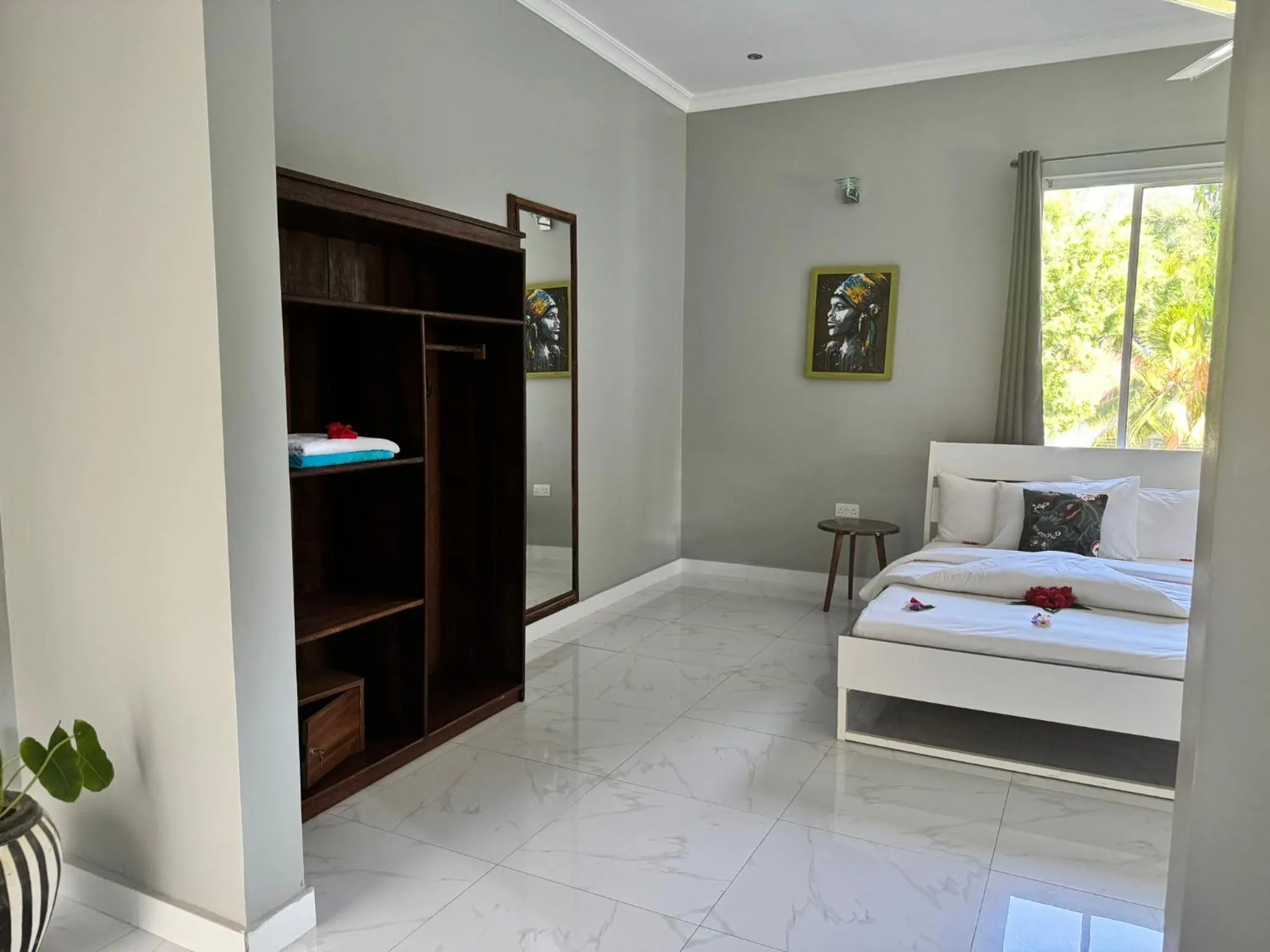 Bed in Calamari Beach Resort