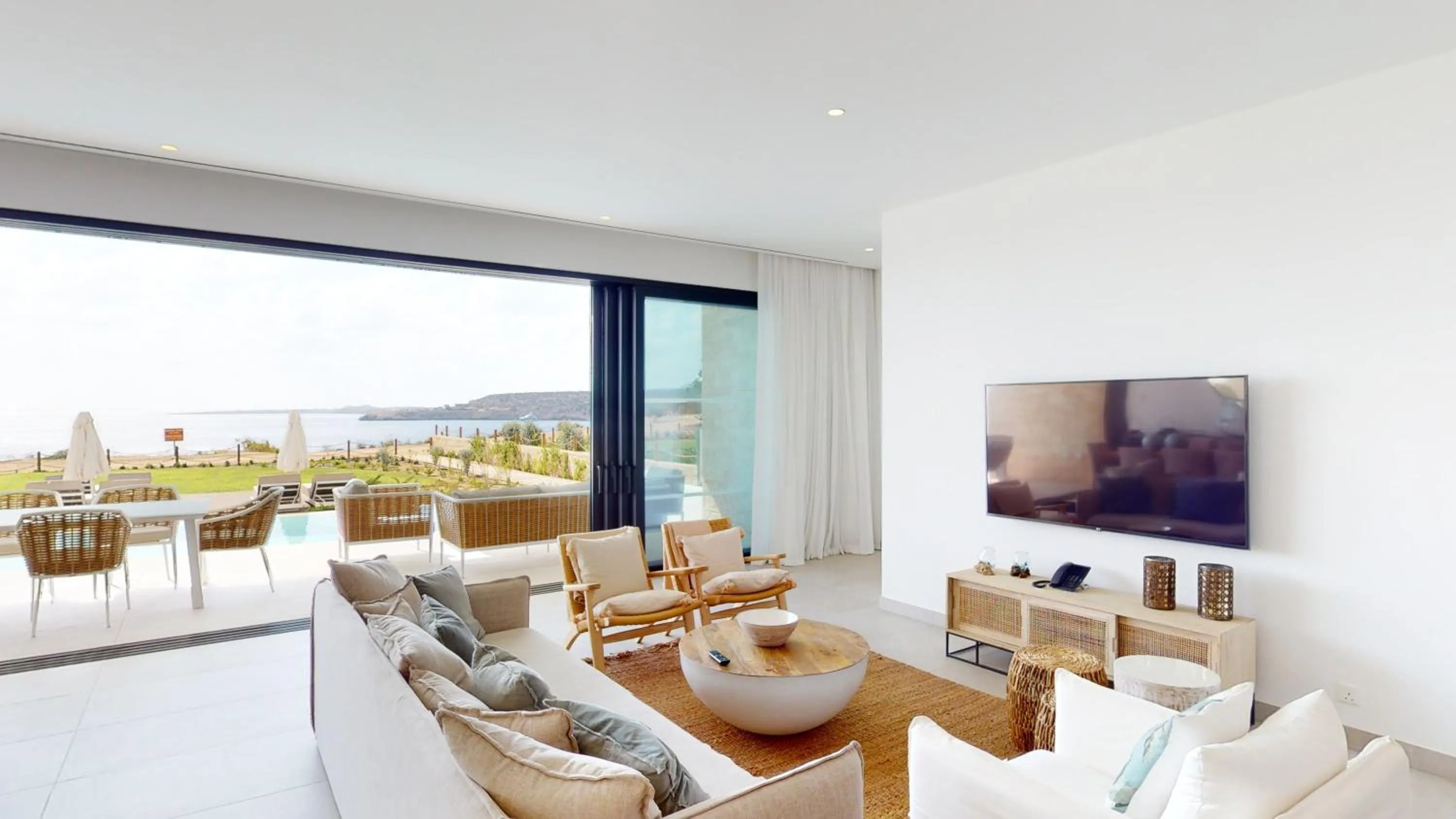 Seating area in Periyiali Konnos Villas Beach Resort