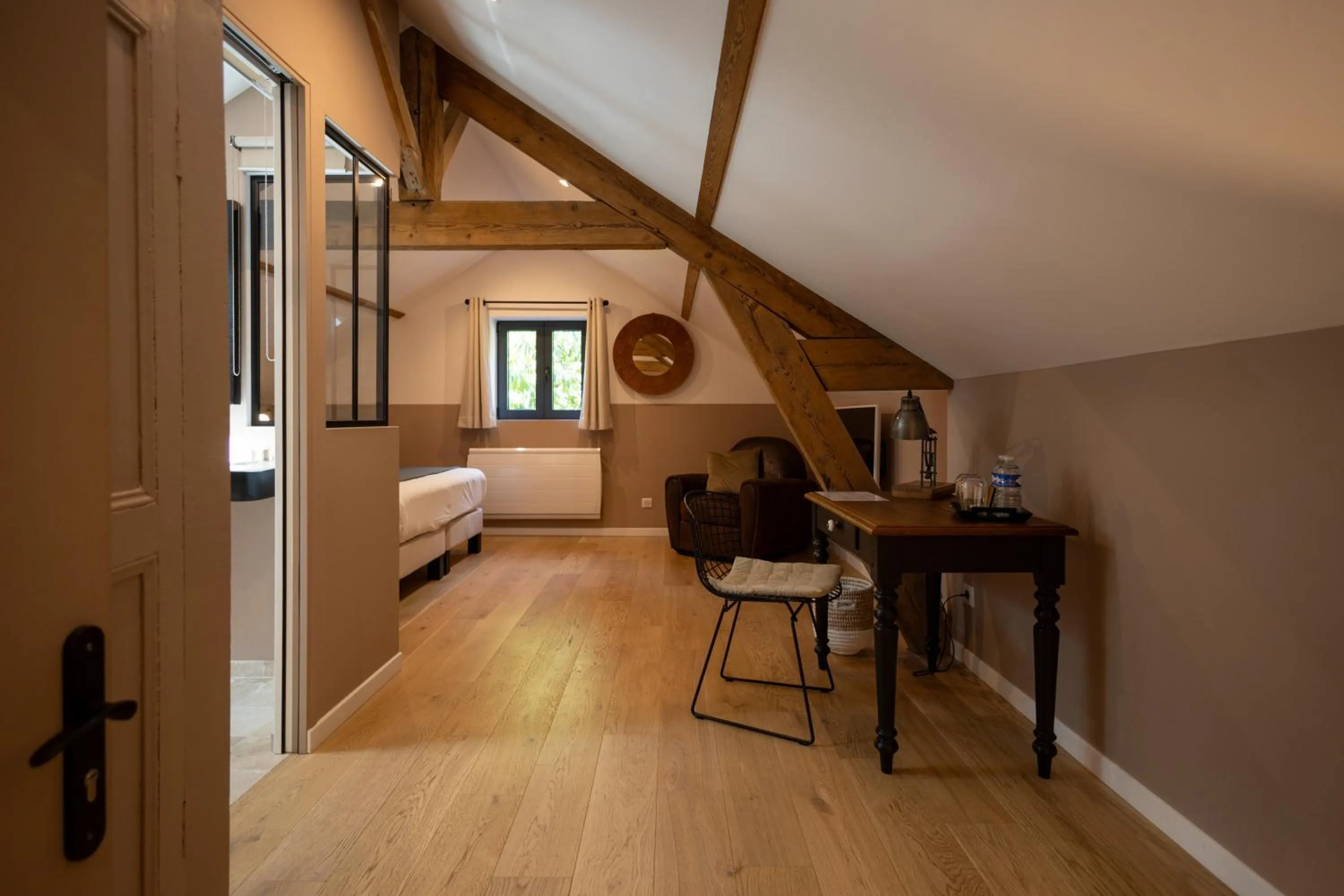 Bed in L'Atelier des Magnolias