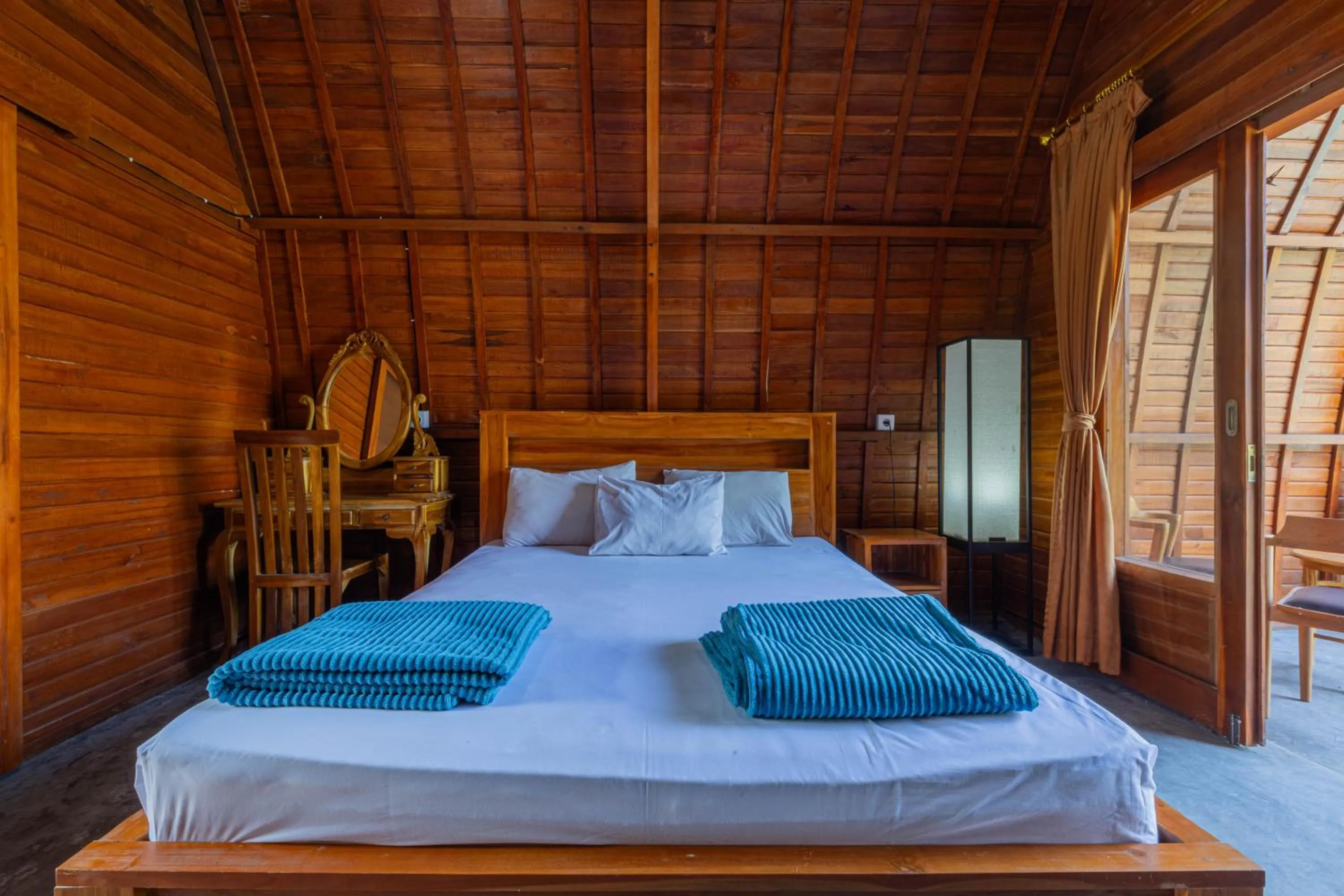 Bed in Kubu Selat Villa and Glamping