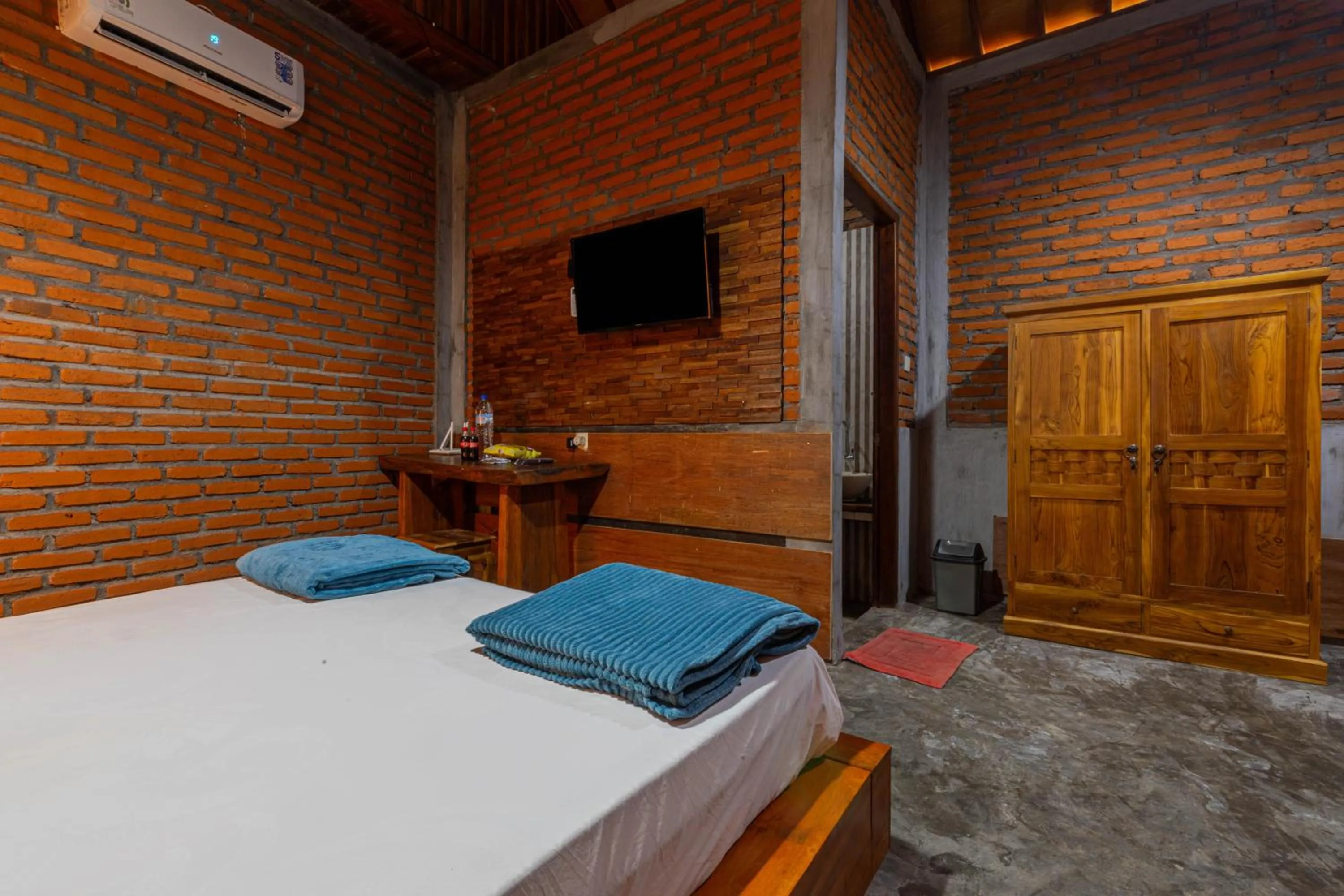 Bed in Kubu Selat Villa and Glamping