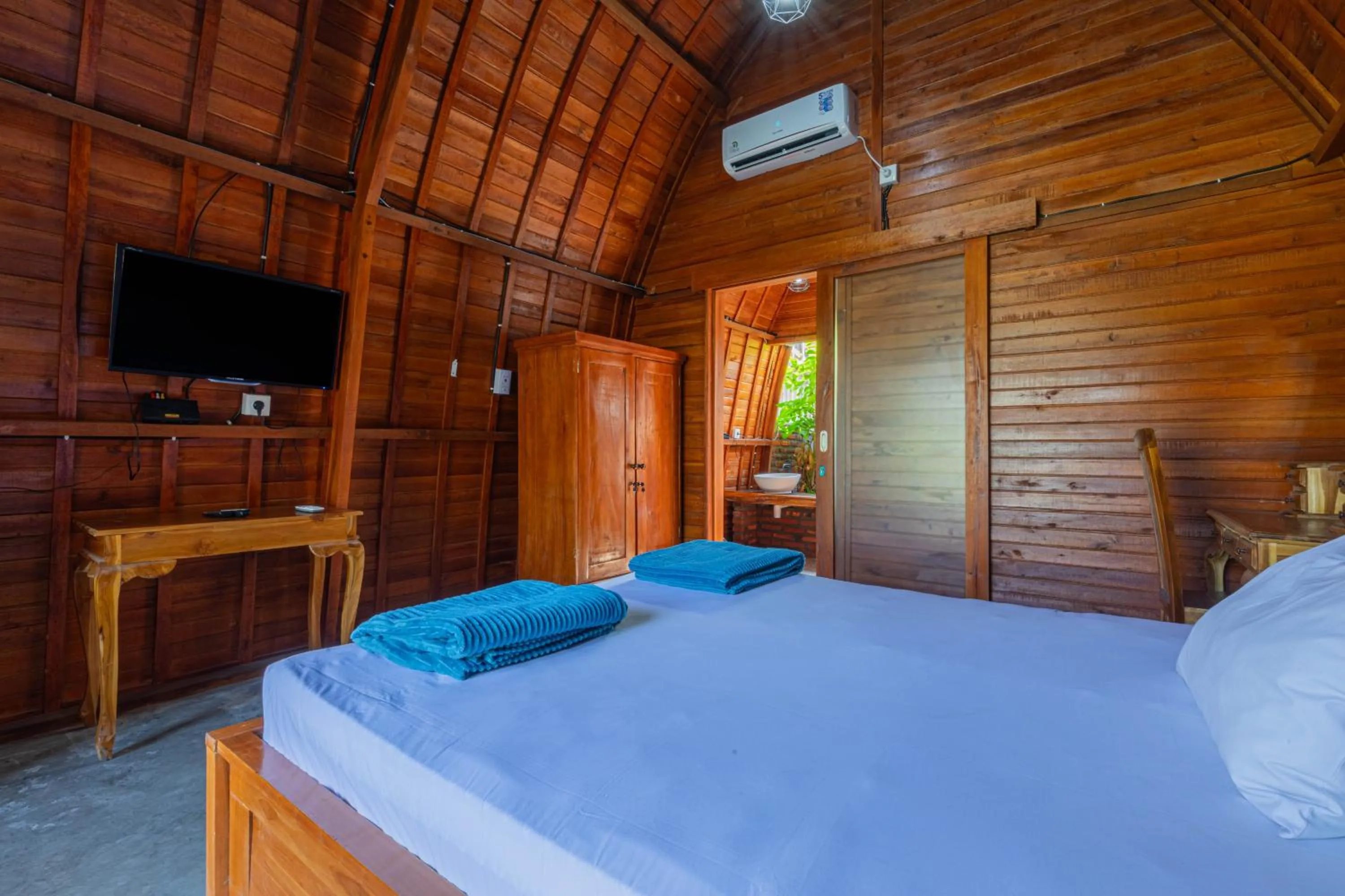 Bed in Kubu Selat Villa and Glamping