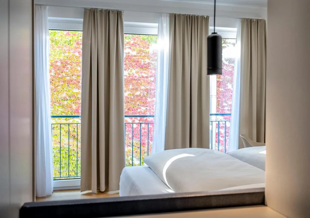 Inner courtyard view, Bed in Boutique Hotel Hauser