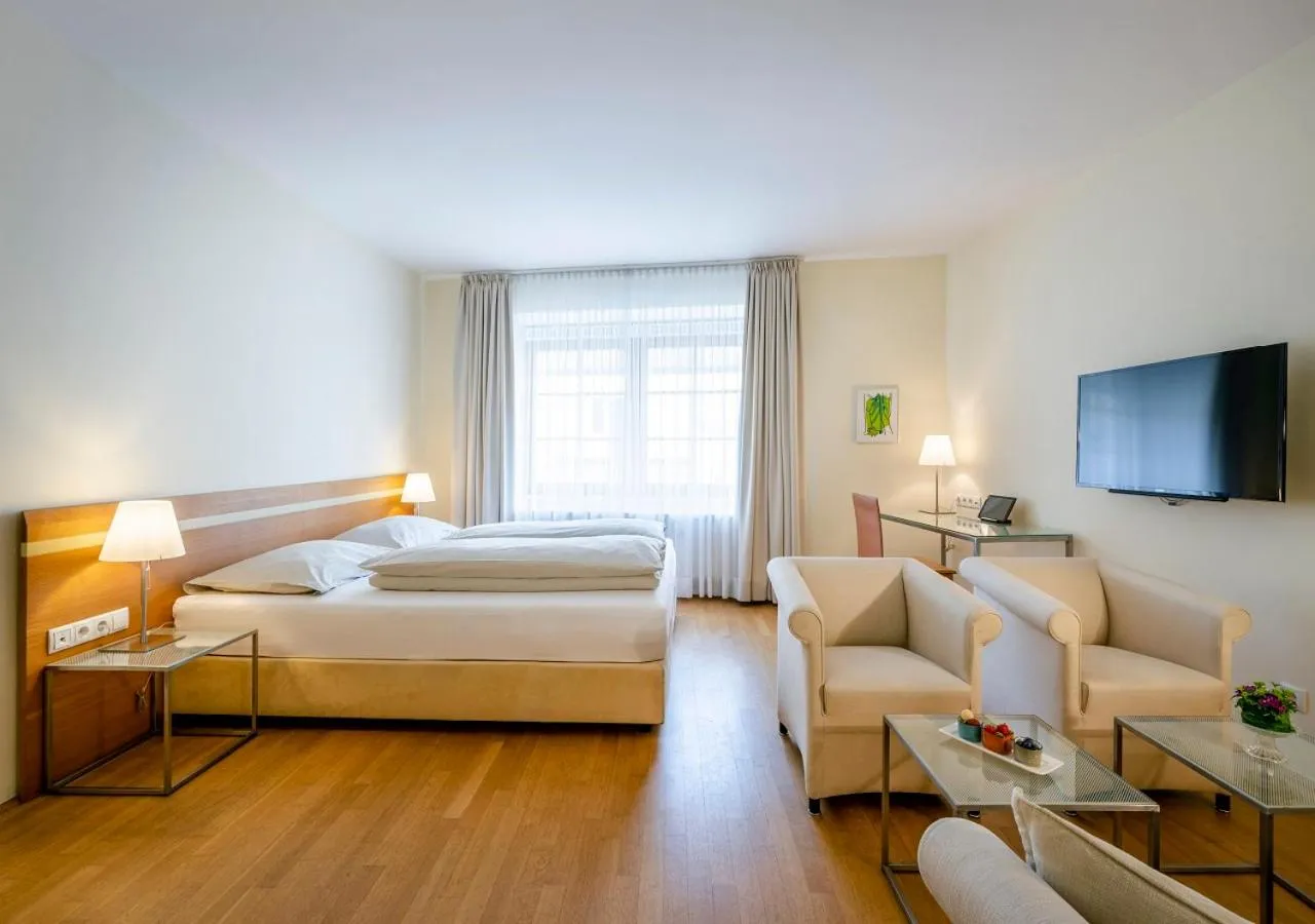 TV and multimedia, Bed in Boutique Hotel Hauser