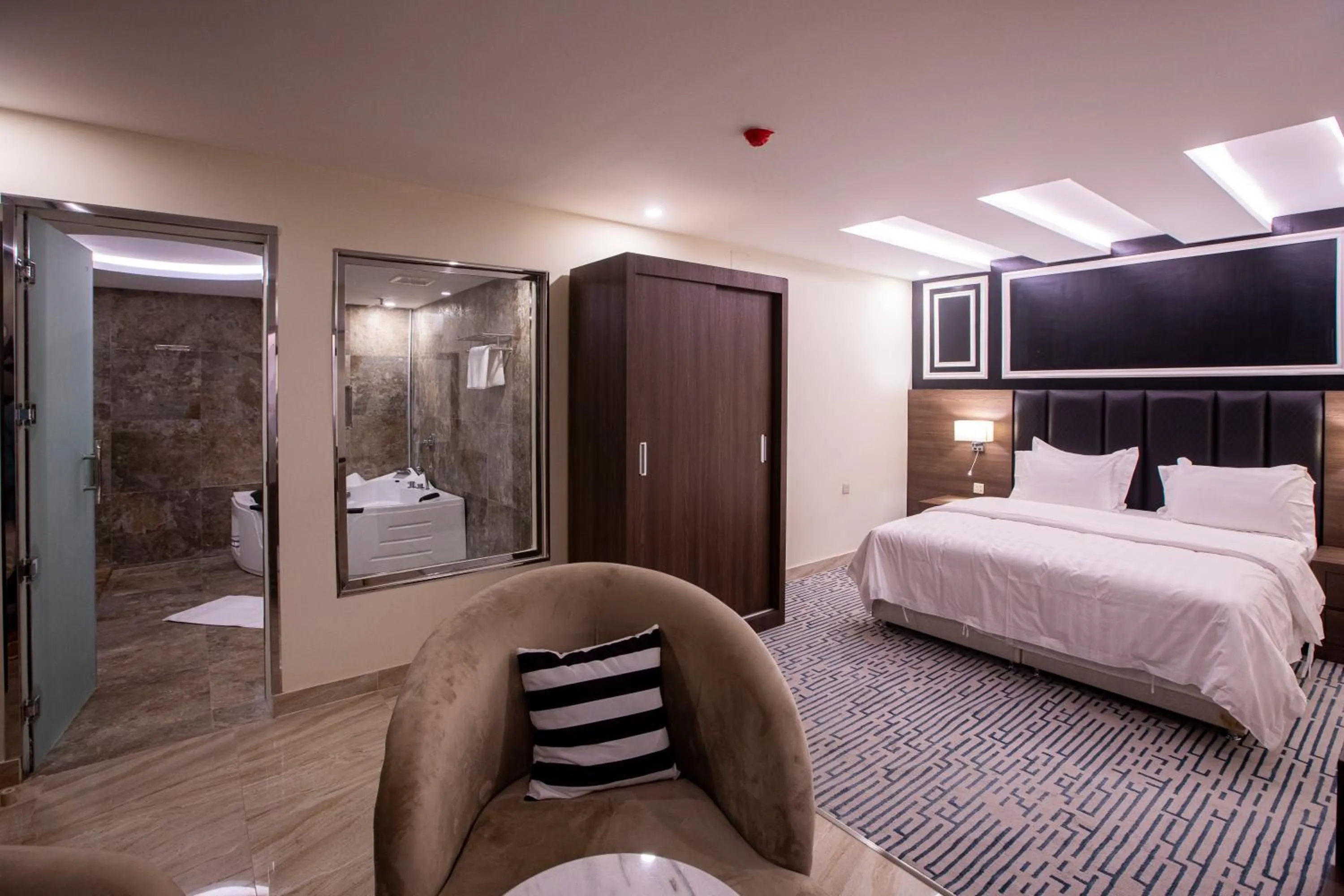 Bed in Olive Tree Hotel