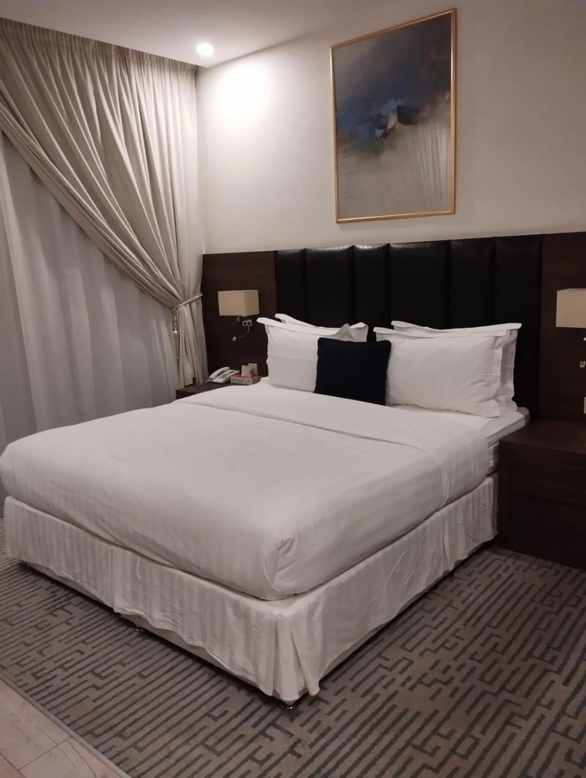 Bed in Olive Tree Hotel