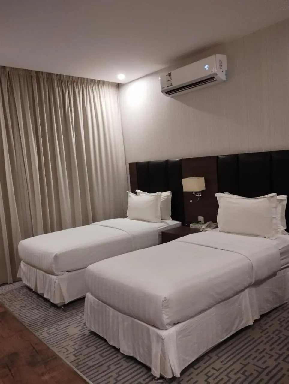 Bed in Olive Tree Hotel