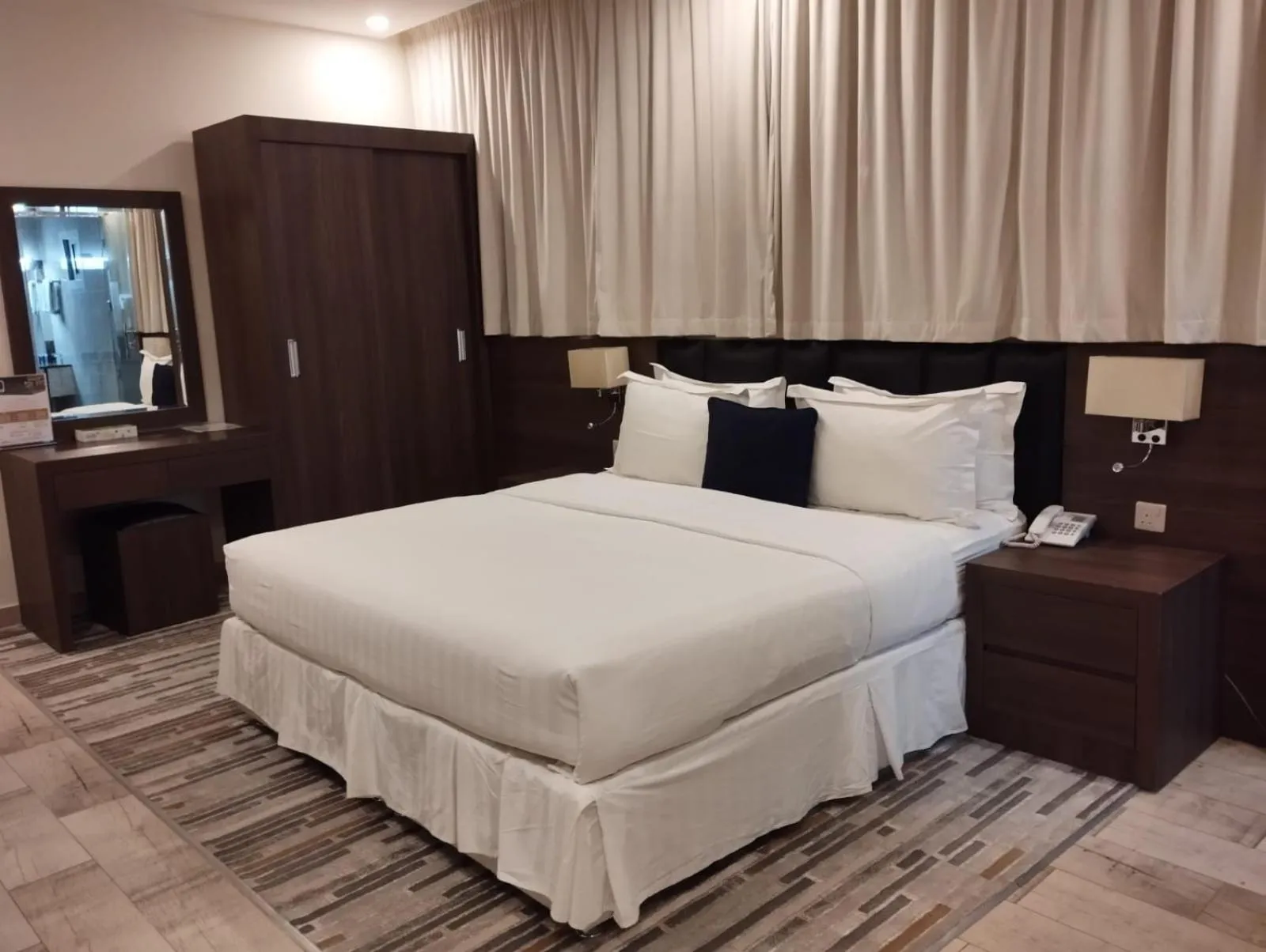 Bed in Olive Tree Hotel