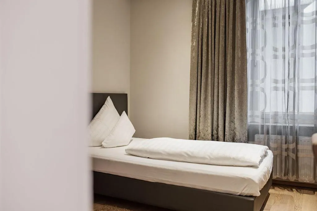 Bed in Stadthotel Goldenes Schiff