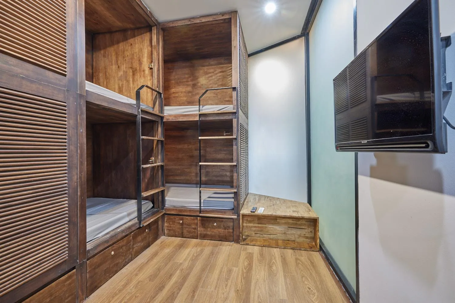 Bed in The Garden Capsule Hotel
