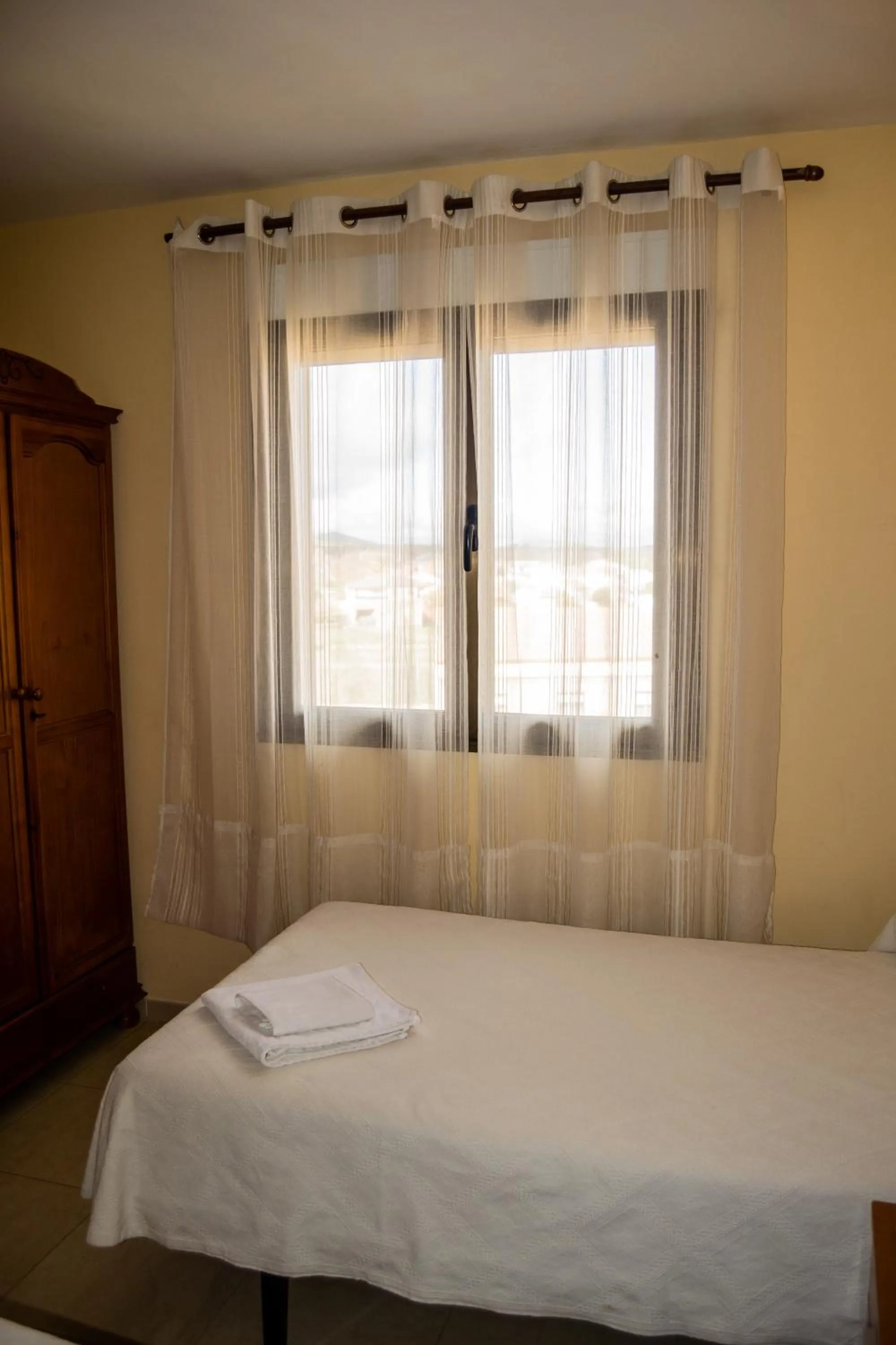 Bed in El Roble Hotel Restaurante