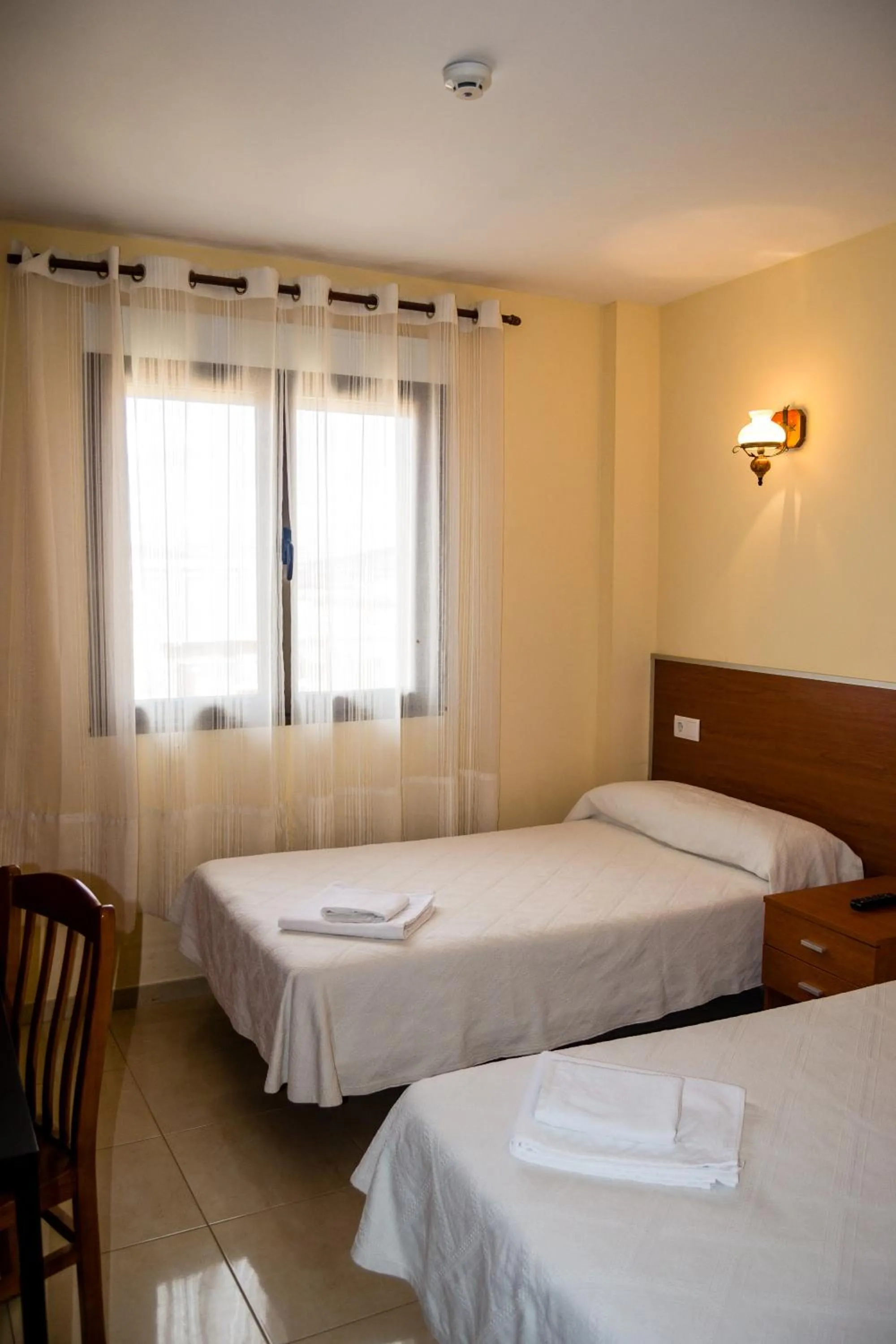 Bed in El Roble Hotel Restaurante