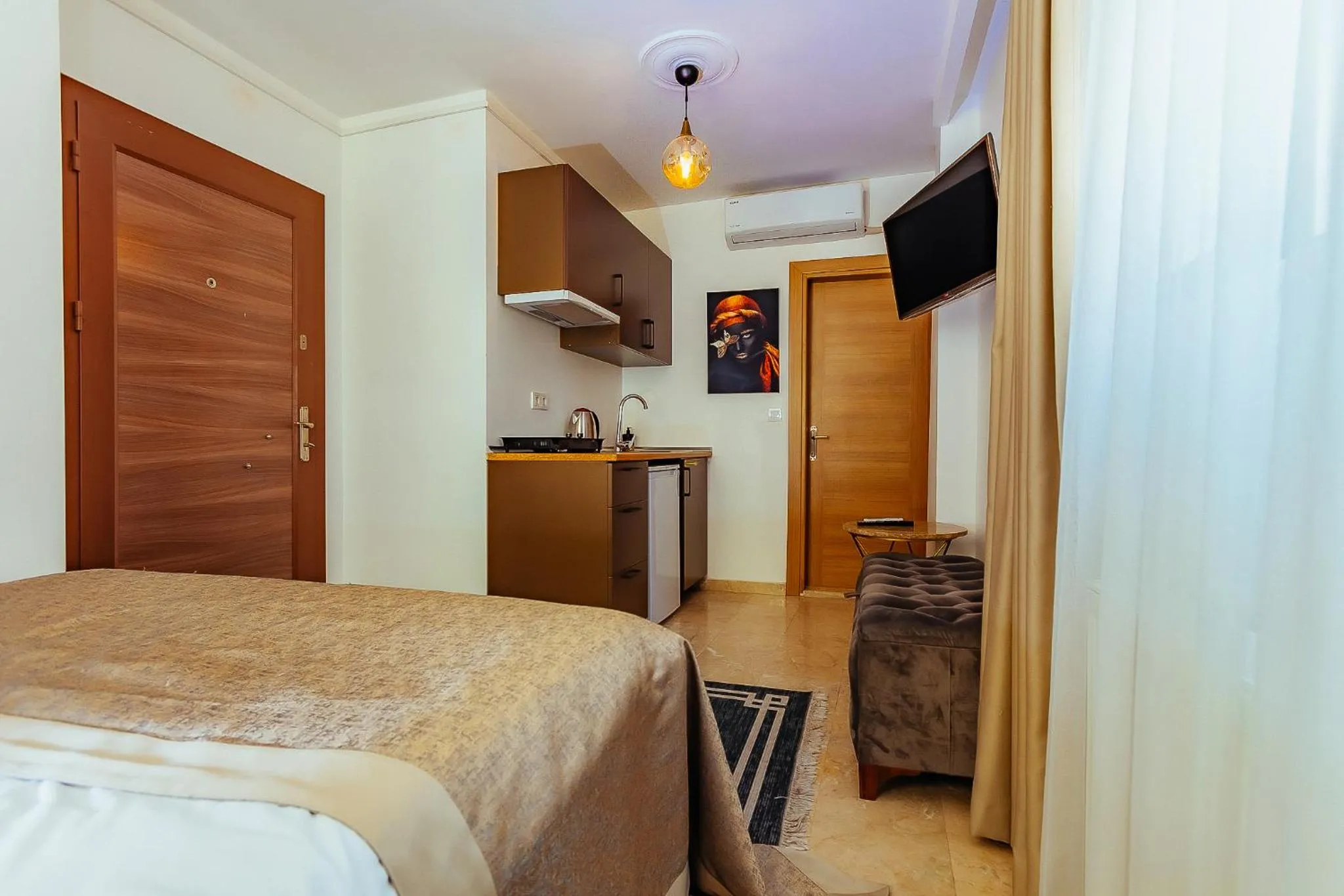 Kitchen or kitchenette, Bed in Taksim Wonder Suites