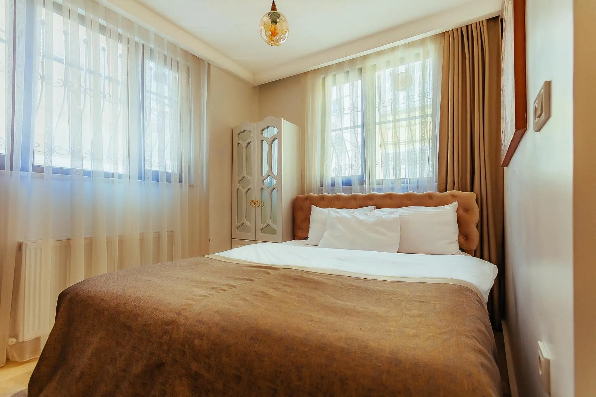 Bed in Taksim Wonder Suites