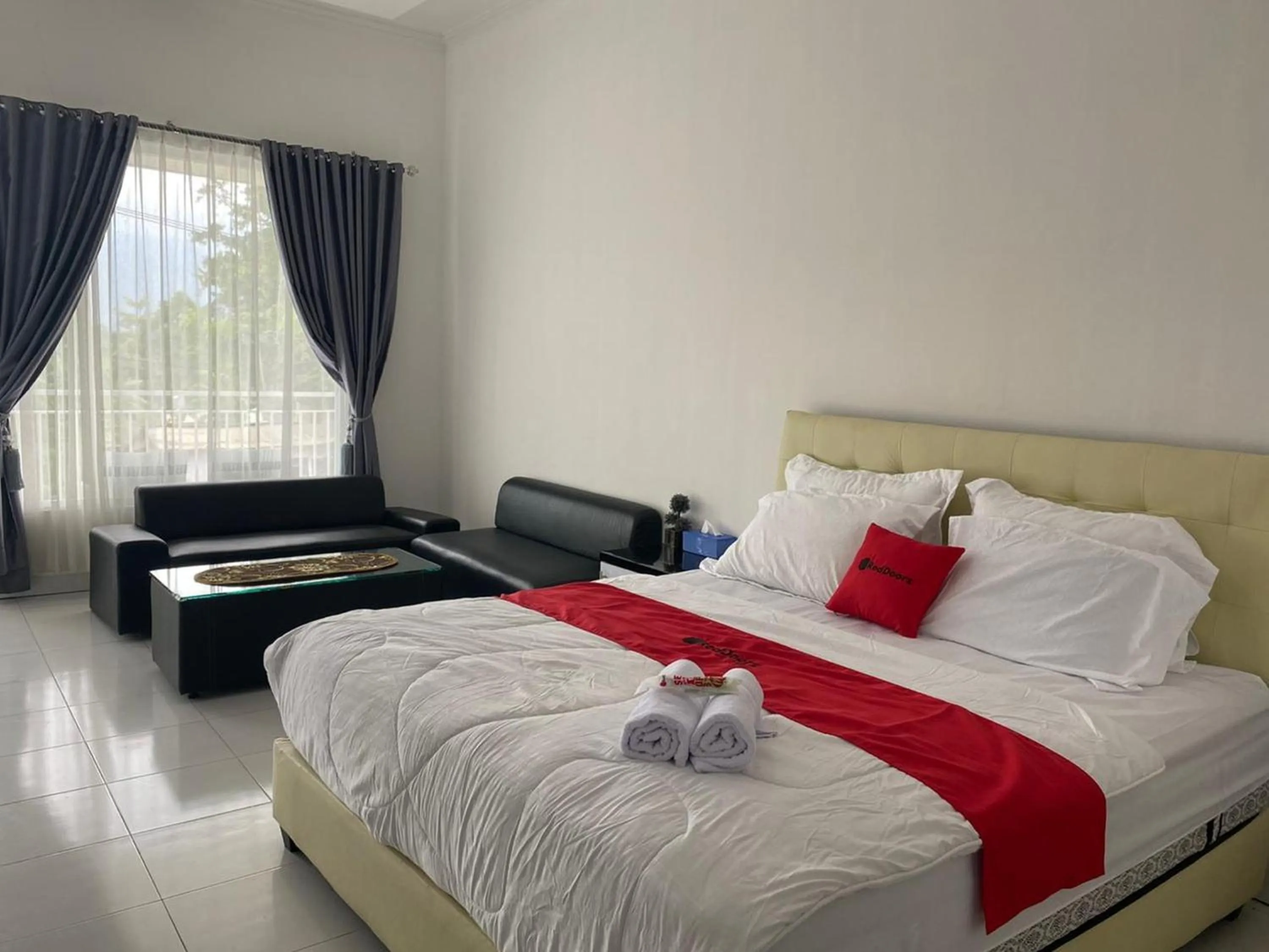 Bed in RedDoorz Plus at Puncak Mas Cottage Lampung