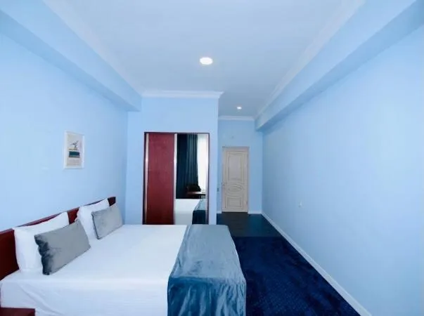 Bed in Grand Fortune Hotel