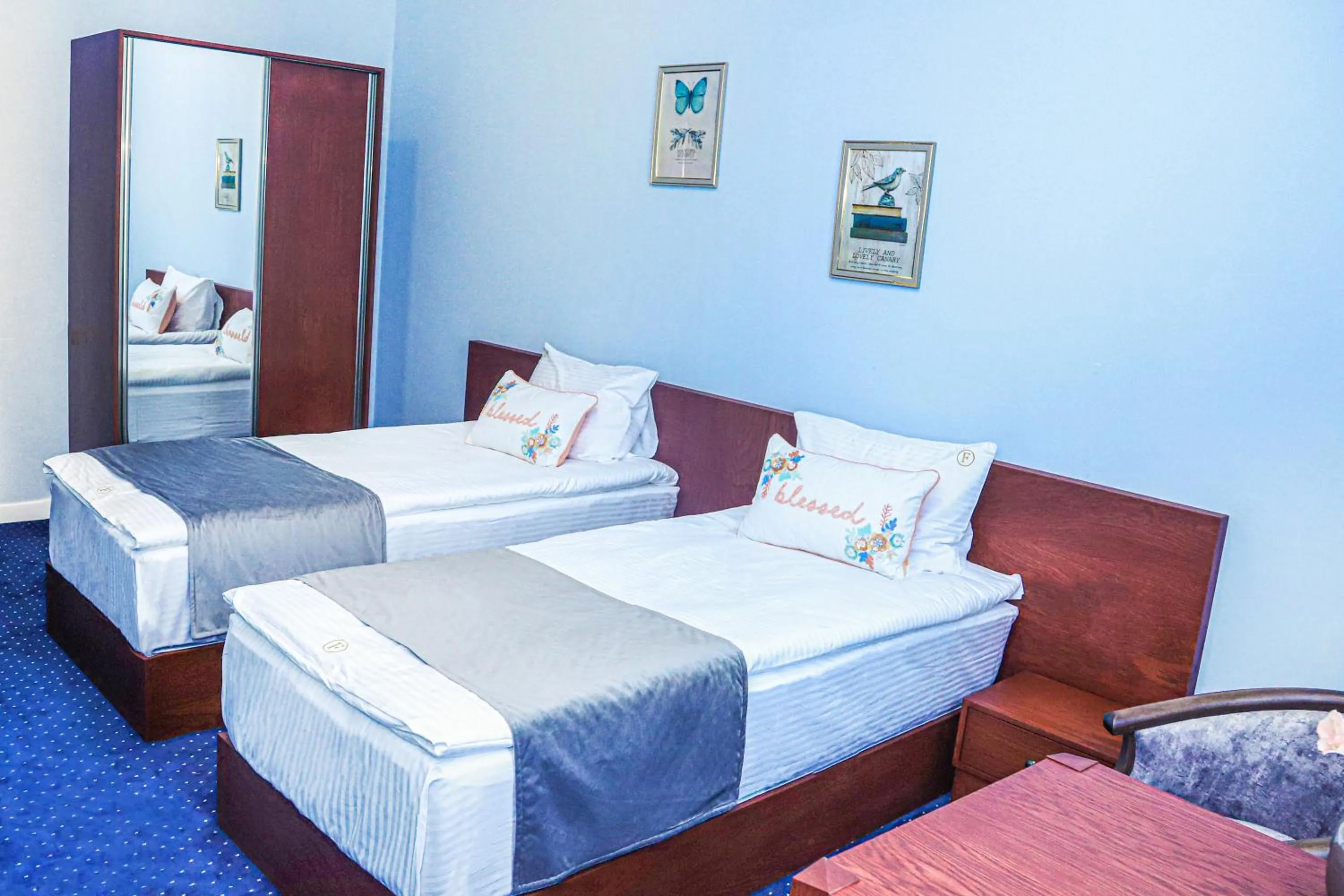 Bed in Grand Fortune Hotel