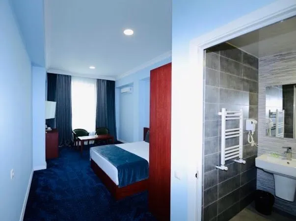 Bathroom, Bed in Grand Fortune Hotel