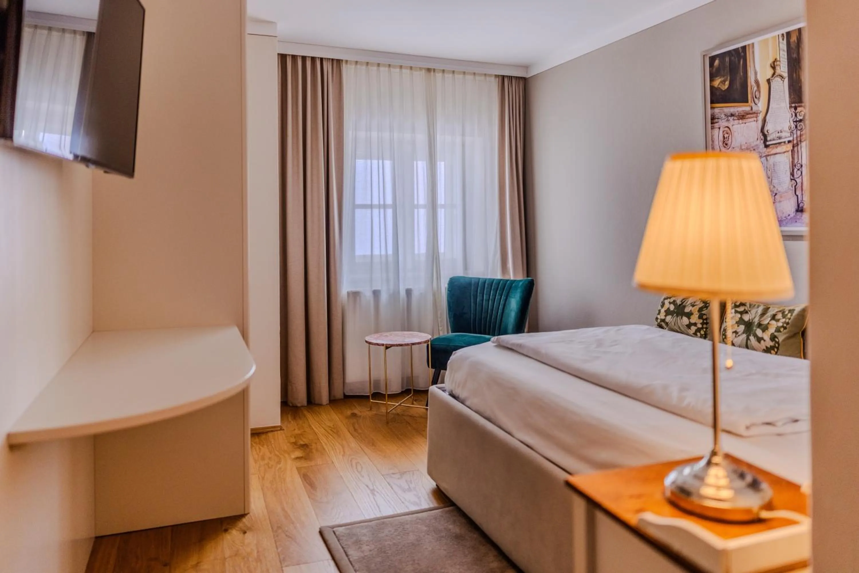 Bed in Boutiquehotel Amadeus