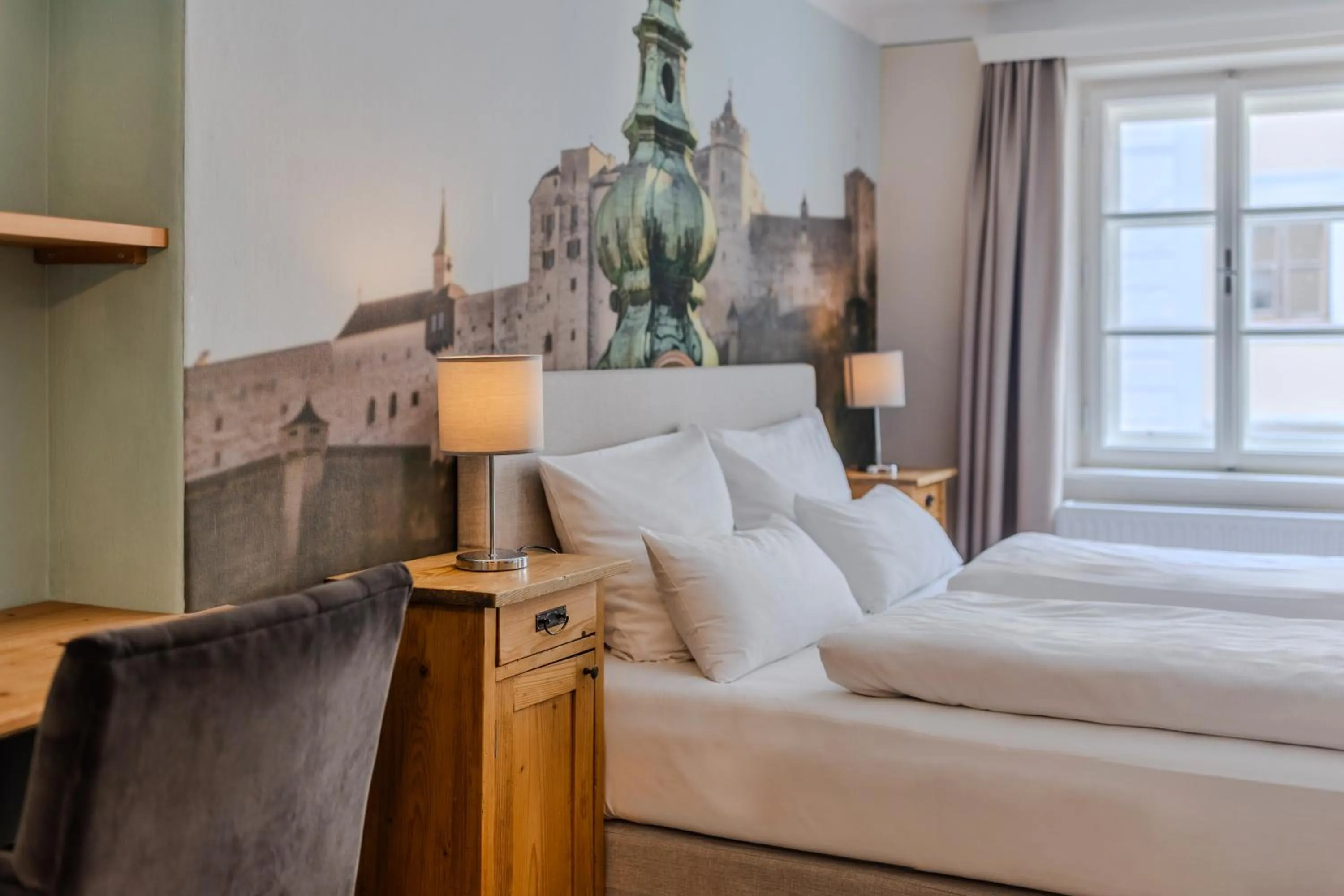 Bed in Boutiquehotel Amadeus