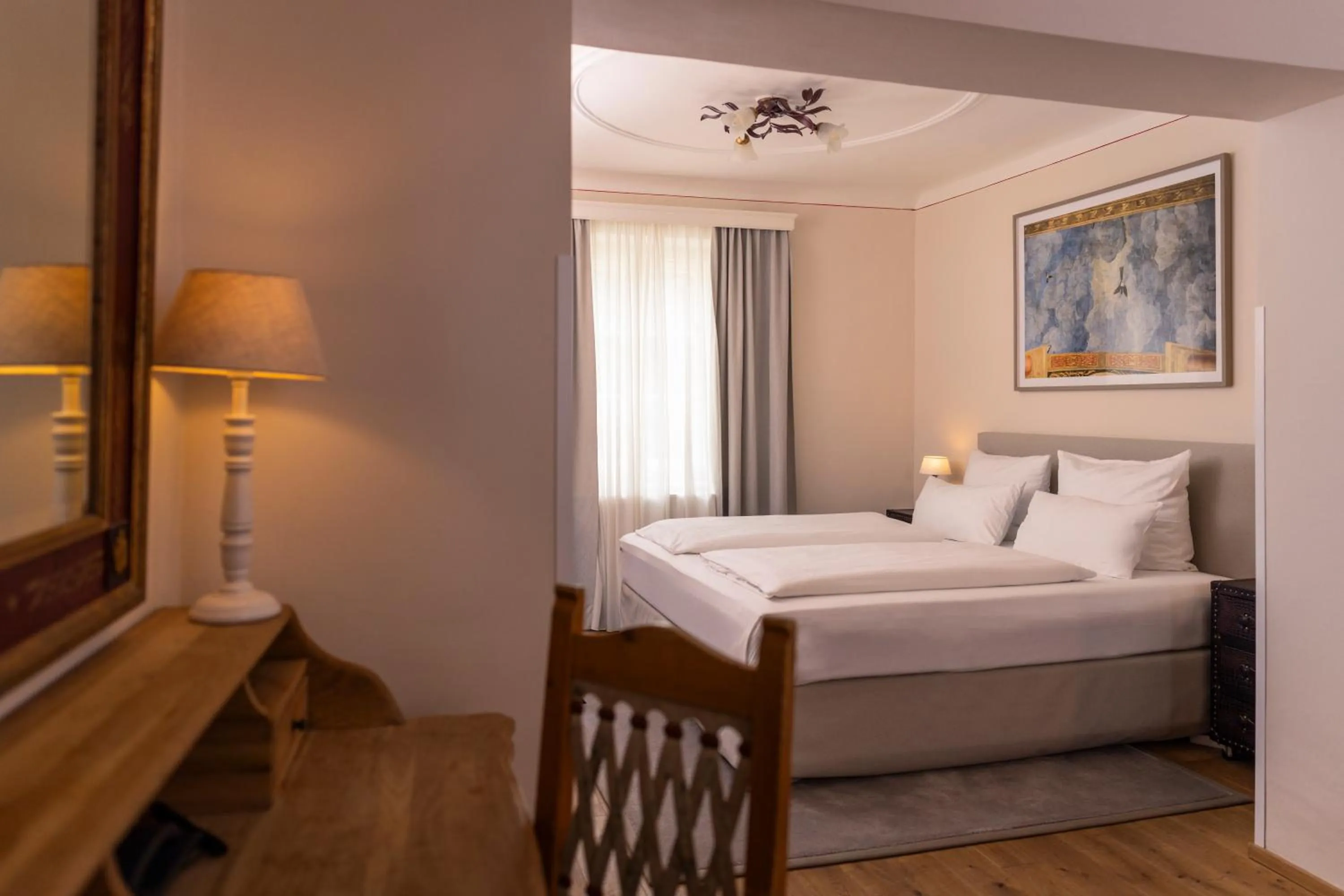 Bed in Boutiquehotel Amadeus