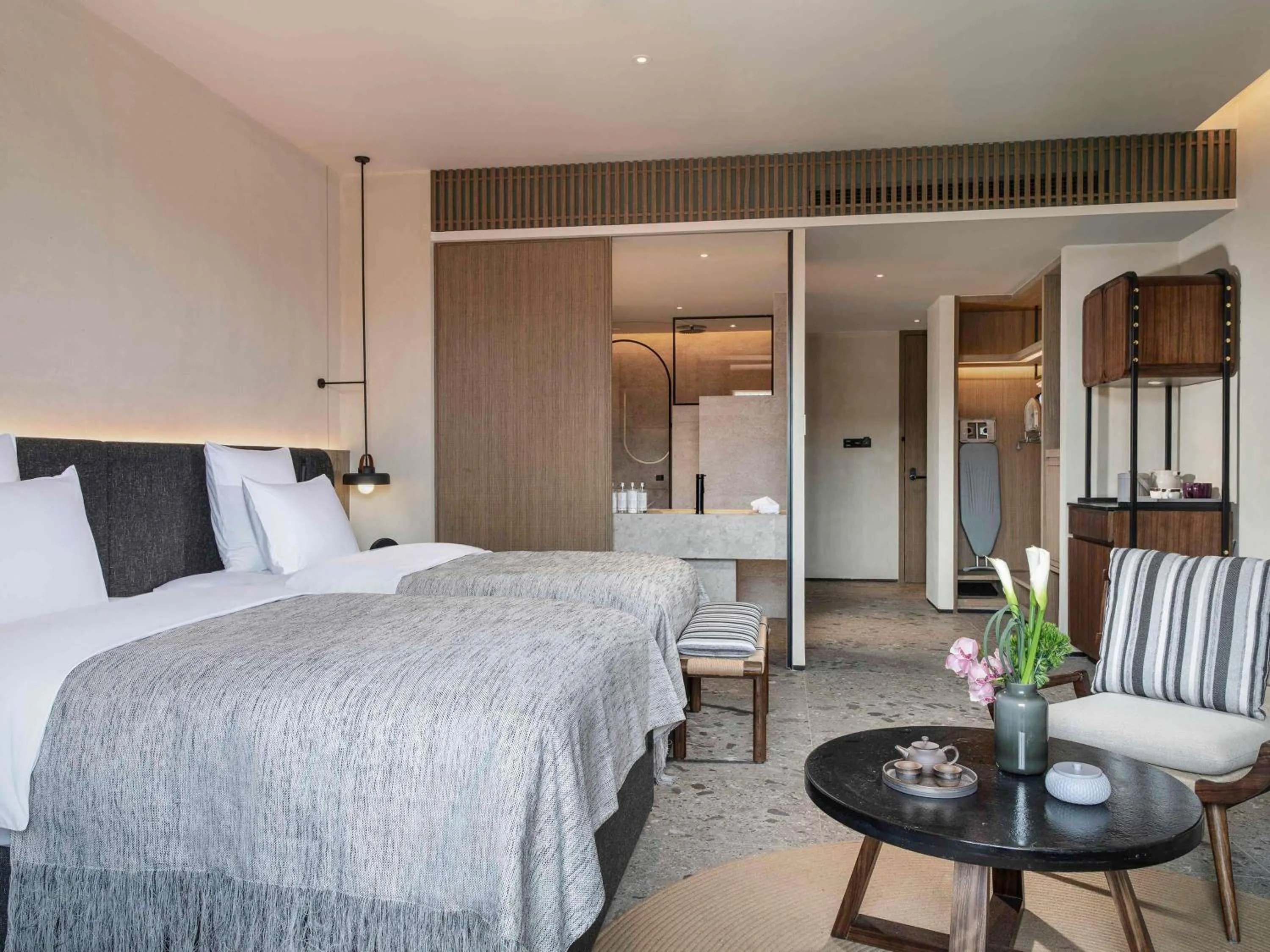 Bedroom, Bed in DongFengYun Hotel Mi'Le - MGallery Collection