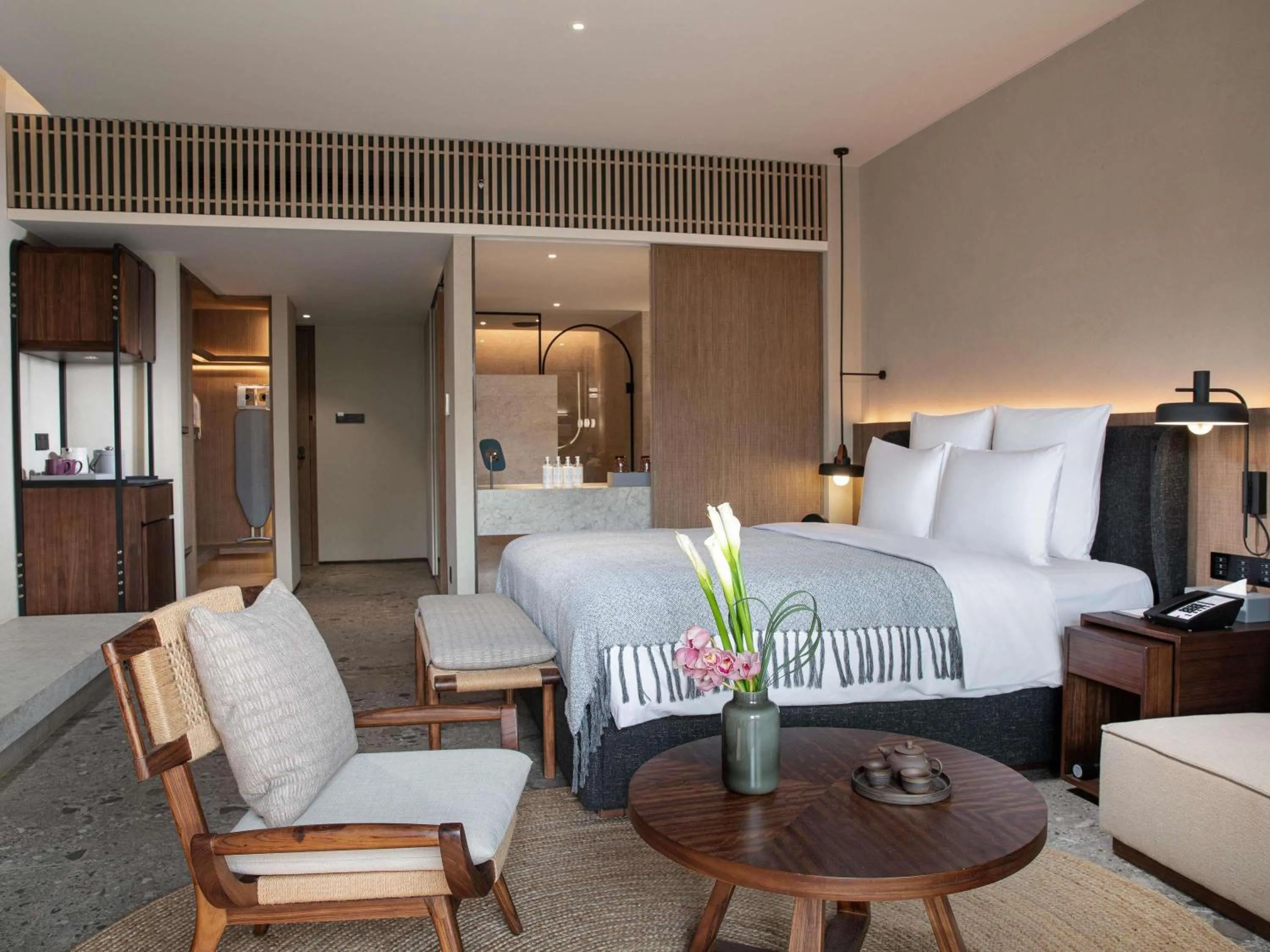 Bedroom, Bed in DongFengYun Hotel Mi'Le - MGallery Collection