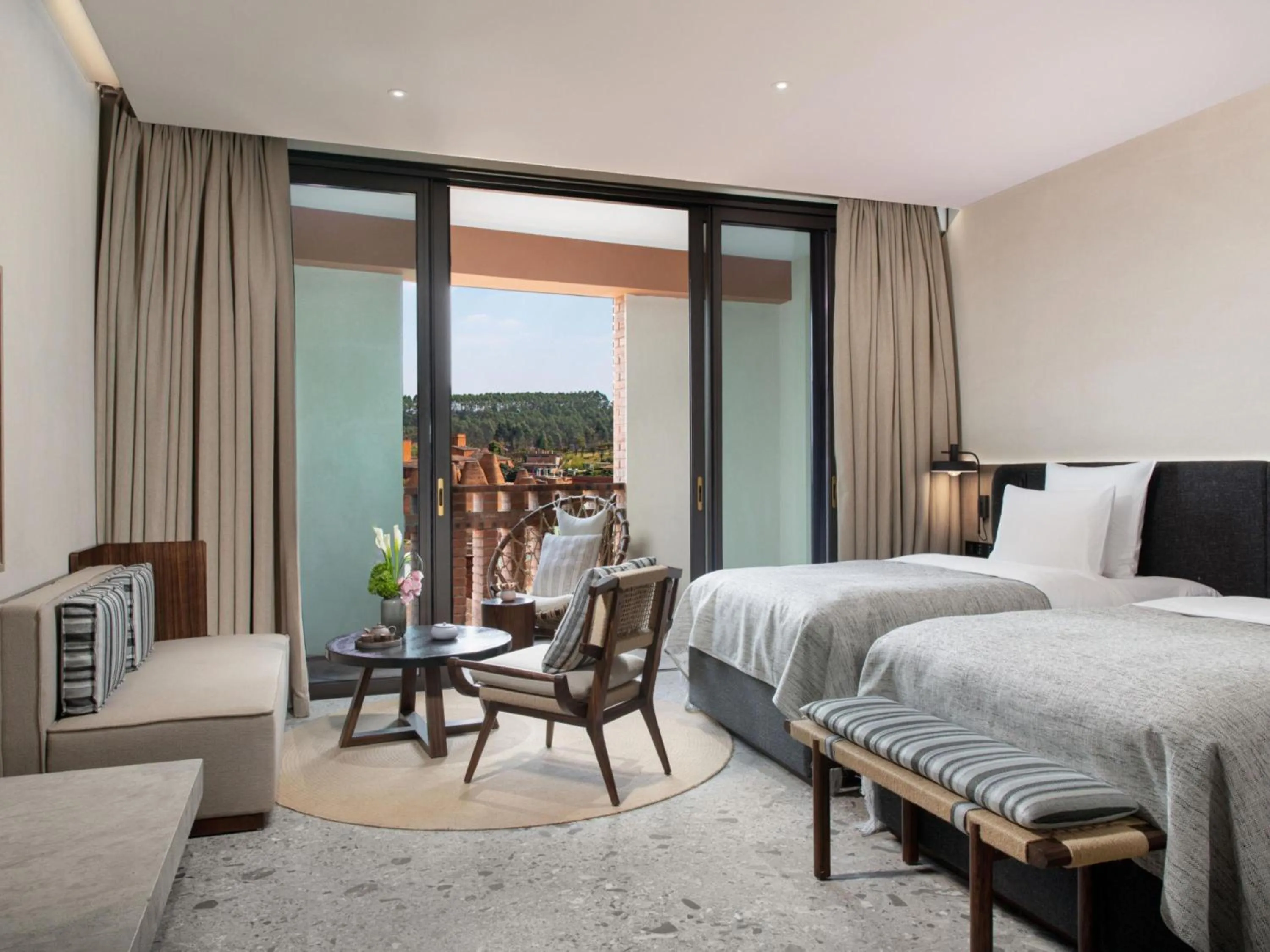 Bedroom, Bed in DongFengYun Hotel Mi'Le - MGallery Collection